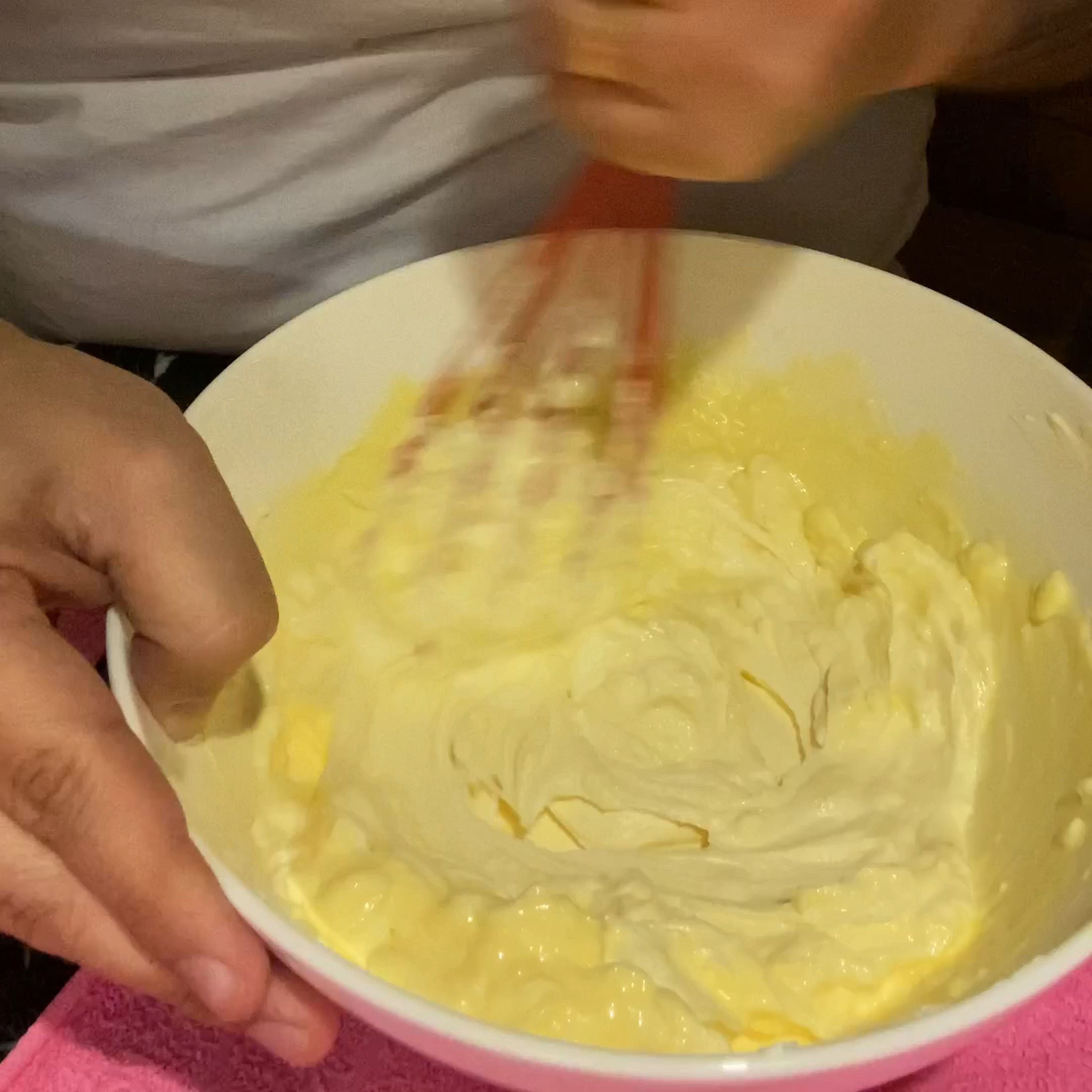 Now is the time to call the lead actor on stage: add your mascarpone cheese inside the cream (the one made with yolks and sugar) and mix gradually until it start to become homogeneous. Tip: mascarpone at room temperature will be easier to mix.