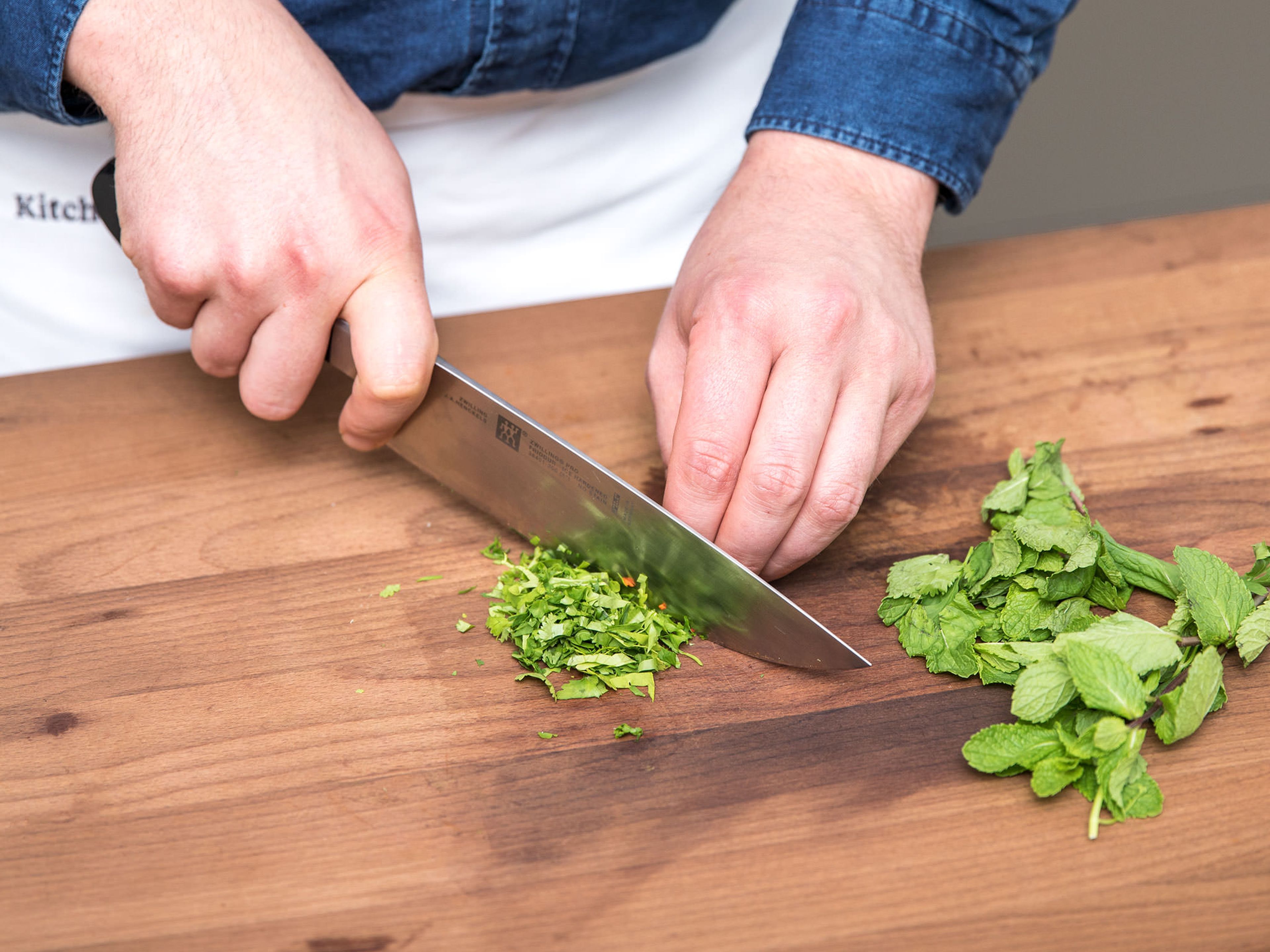 Wash the mint and cilantro, then remove the leaves and chop. Discard the stalks. Chill leaves in the refrigerator.