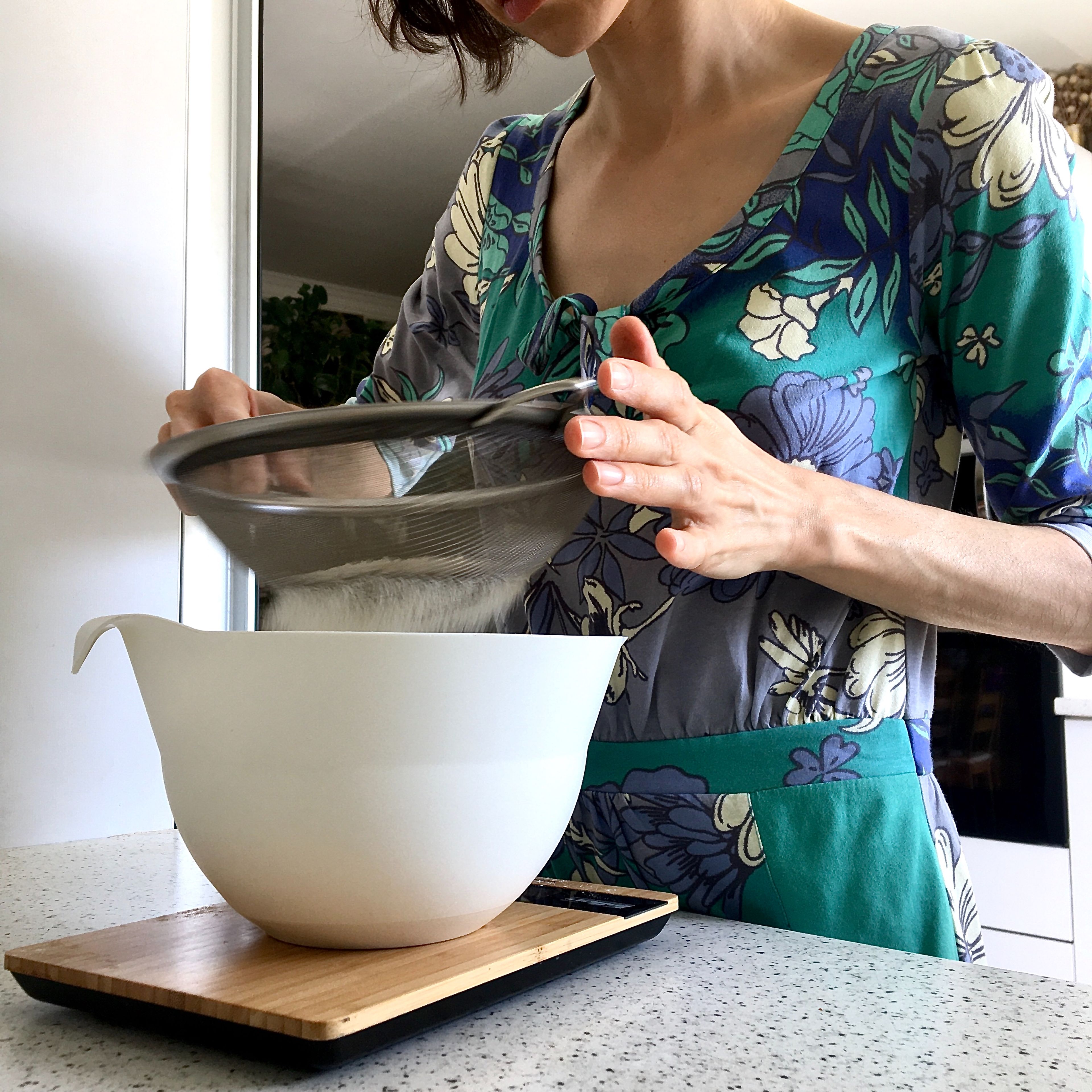 Sift the flour, wheat bran, both baking agents and salt in a bowl. Mix white wine and cherry juice in a measuring cup. Add dry ingredients to the bowl of your wet mixture. Pour in the liquid and fold slowly until no flour clumps are visible.