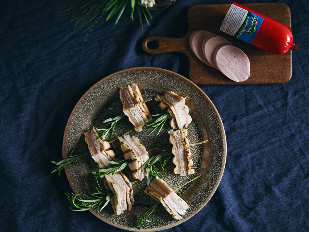 Grilled mortadella and cheese finger sandwiches with rosemary