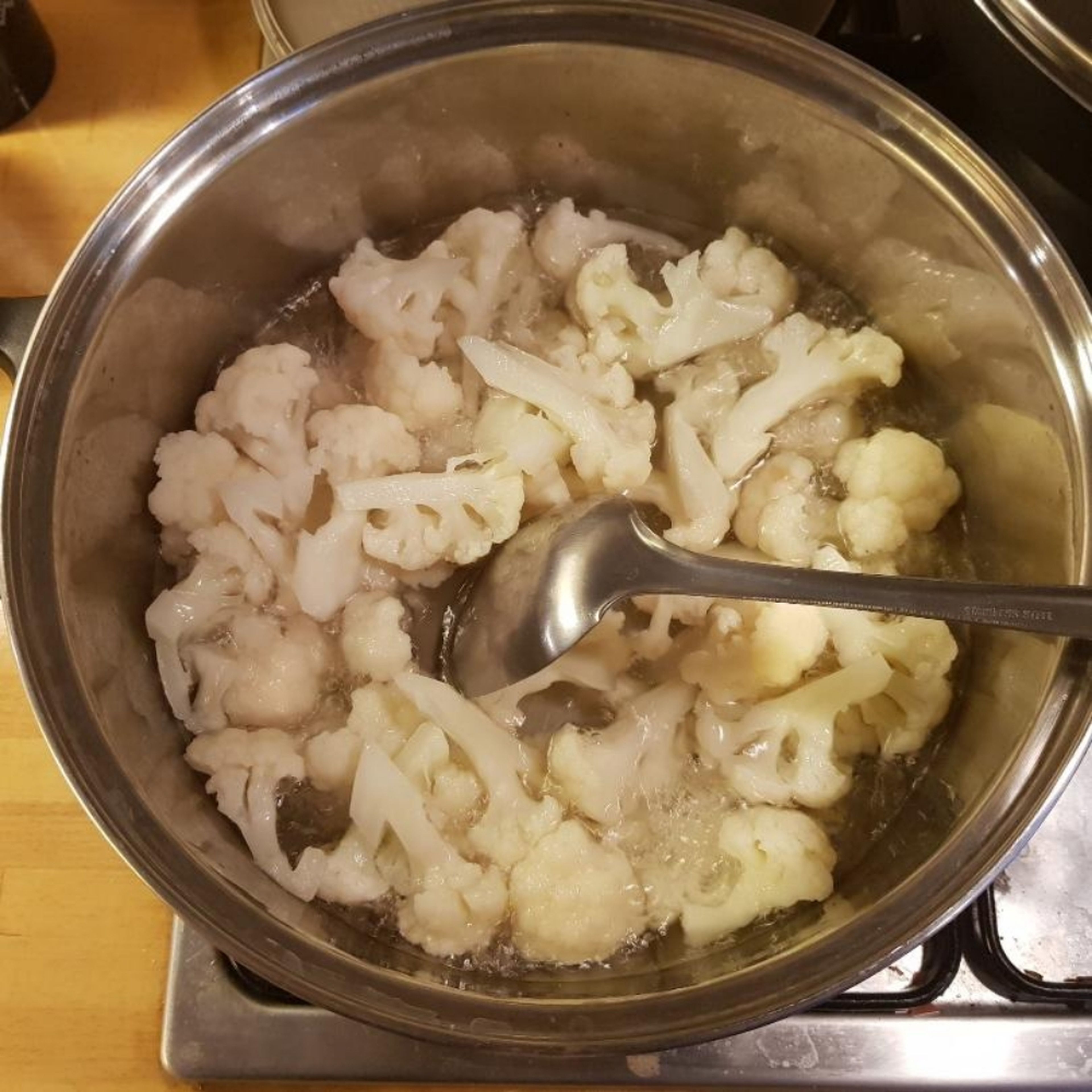 boil the cauliflower to make it soft
