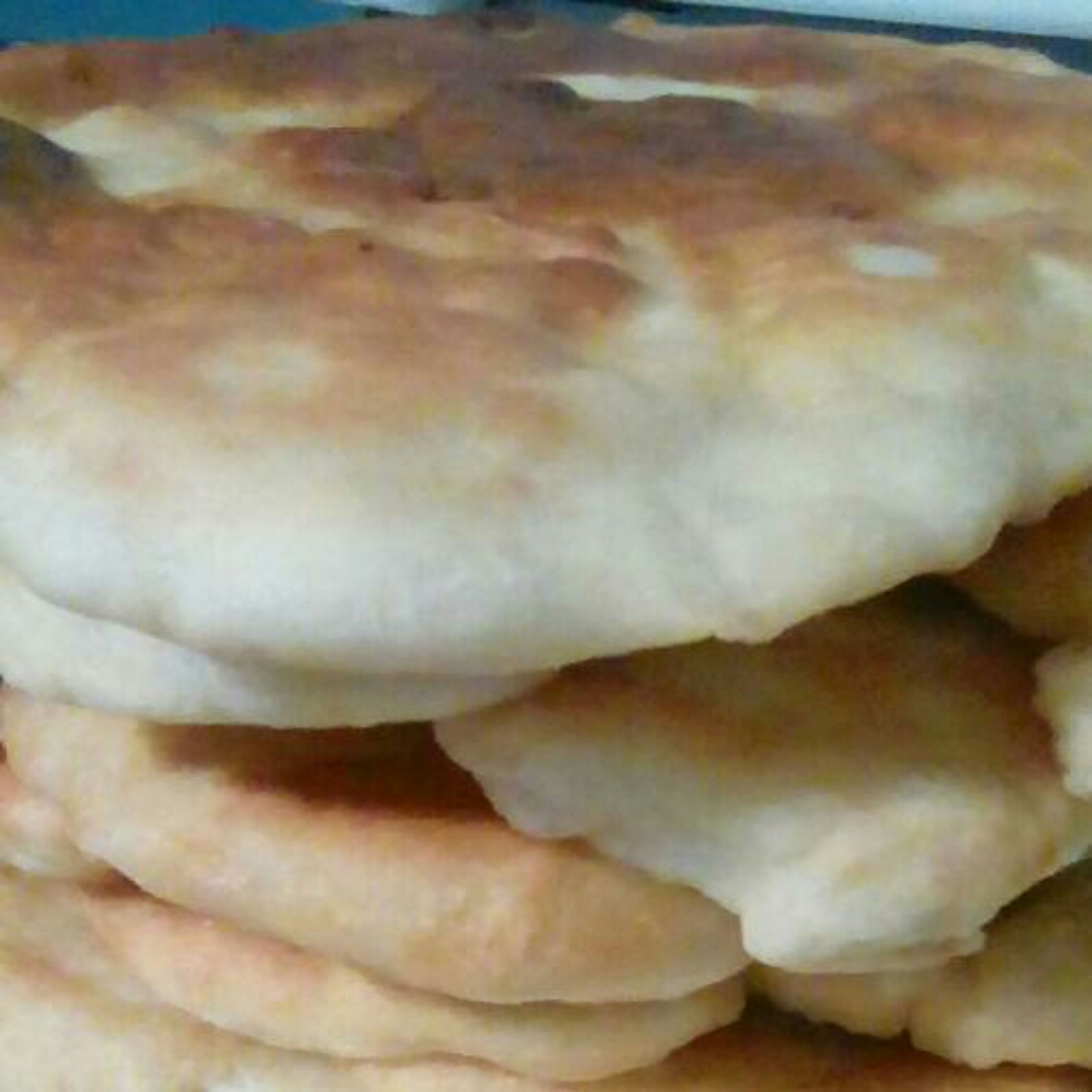 Make the frybread. Stir flour, baking powder, salt, buttermilk -until dough. knead the dough and place in 3\4 much deep oil in a pan. Break 3\4 cup of dough into the oil pan and fry numerous times.
