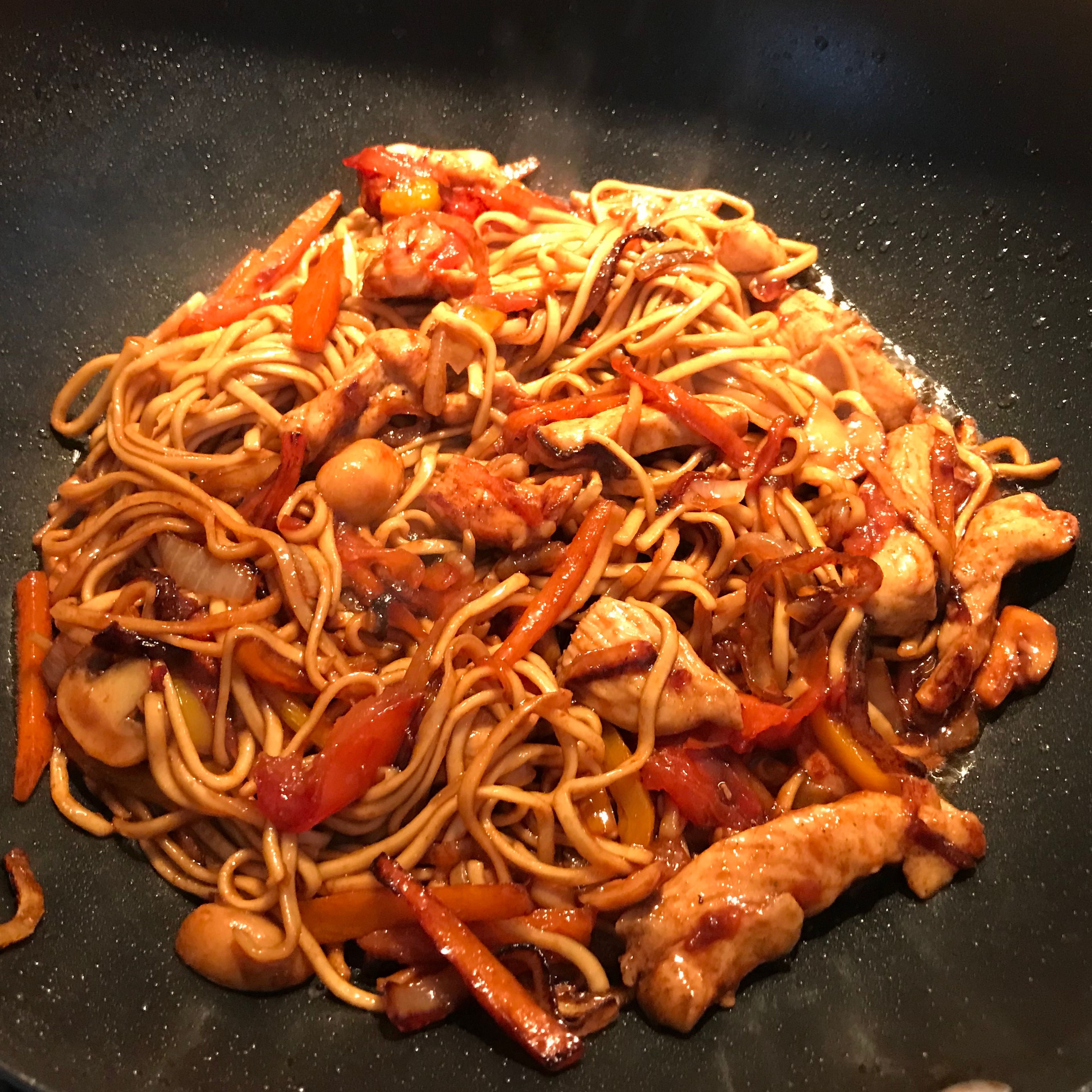 Heat oil in Wok pan and add onions, fry on high heat 1 min , then add carrots and red pepper fry for 2 min. After add mushrooms and tomatoes, stir and fry for 1 min. Make heat little less and add chicken, cook for 2-3min, then add egg noodles on top vinegar, brown sugar and soya sauce. Stir and fry for 3 min.