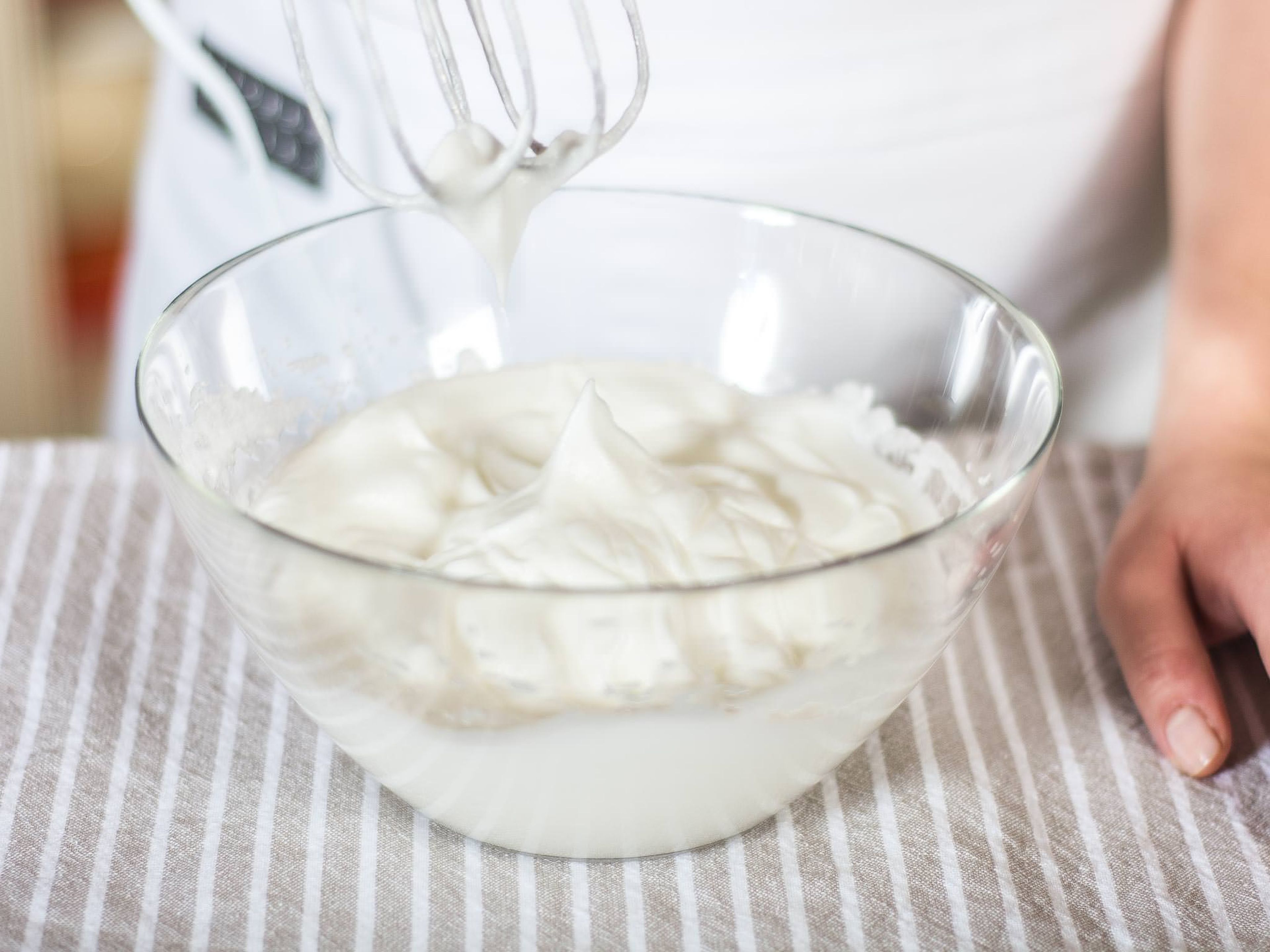 Preheat the oven to 180°C/ 355°F. Beat egg whites until stiff. As soon as it begins to foam, gradually add half of sugar. The bowl and the beater should be free from any kind of grease, to create the desired consistency.