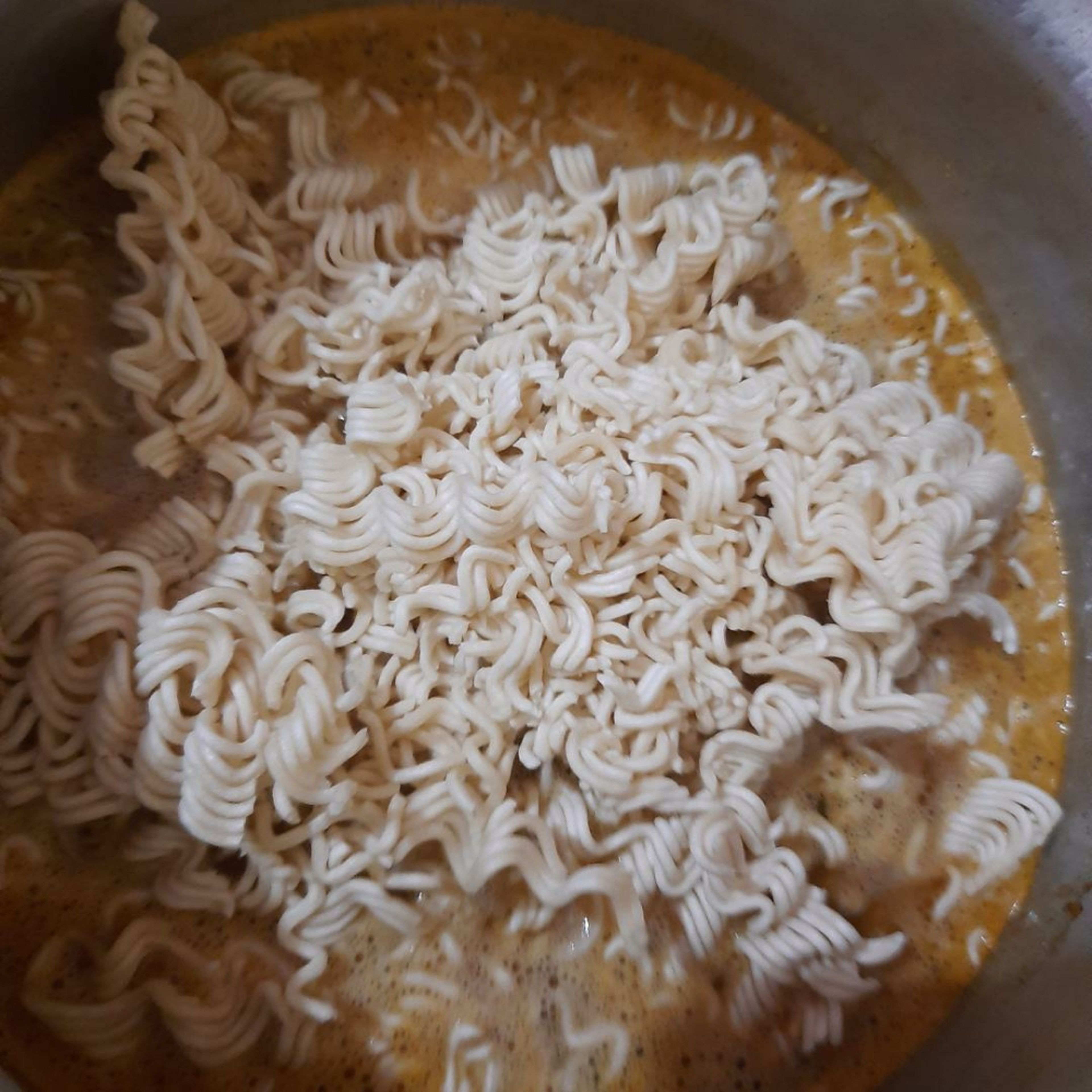 Once the water is boiled, add the instant noodle bars in the water.