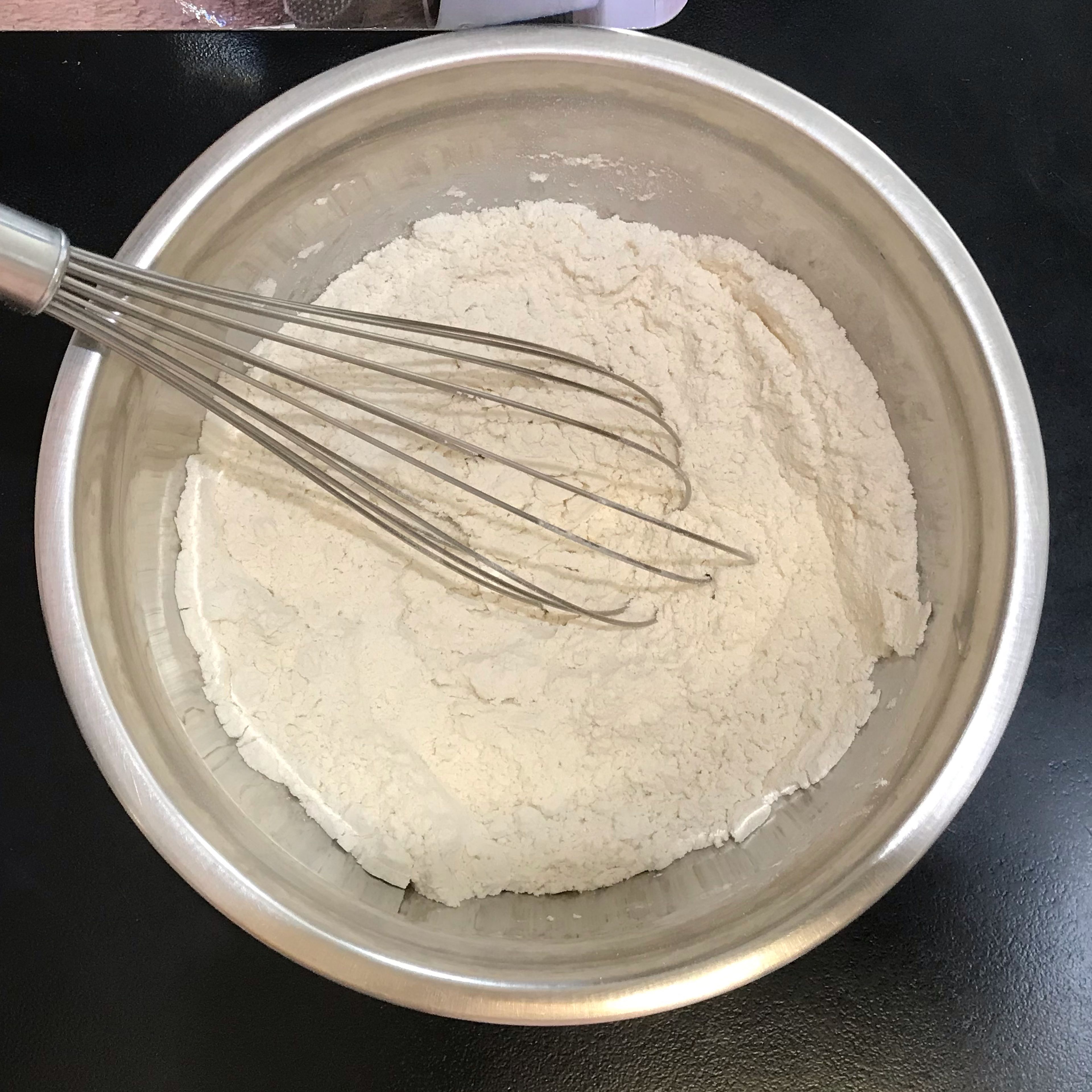 In a separate medium bowl, whisk together the flour, baking powder, baking soda and salt.
