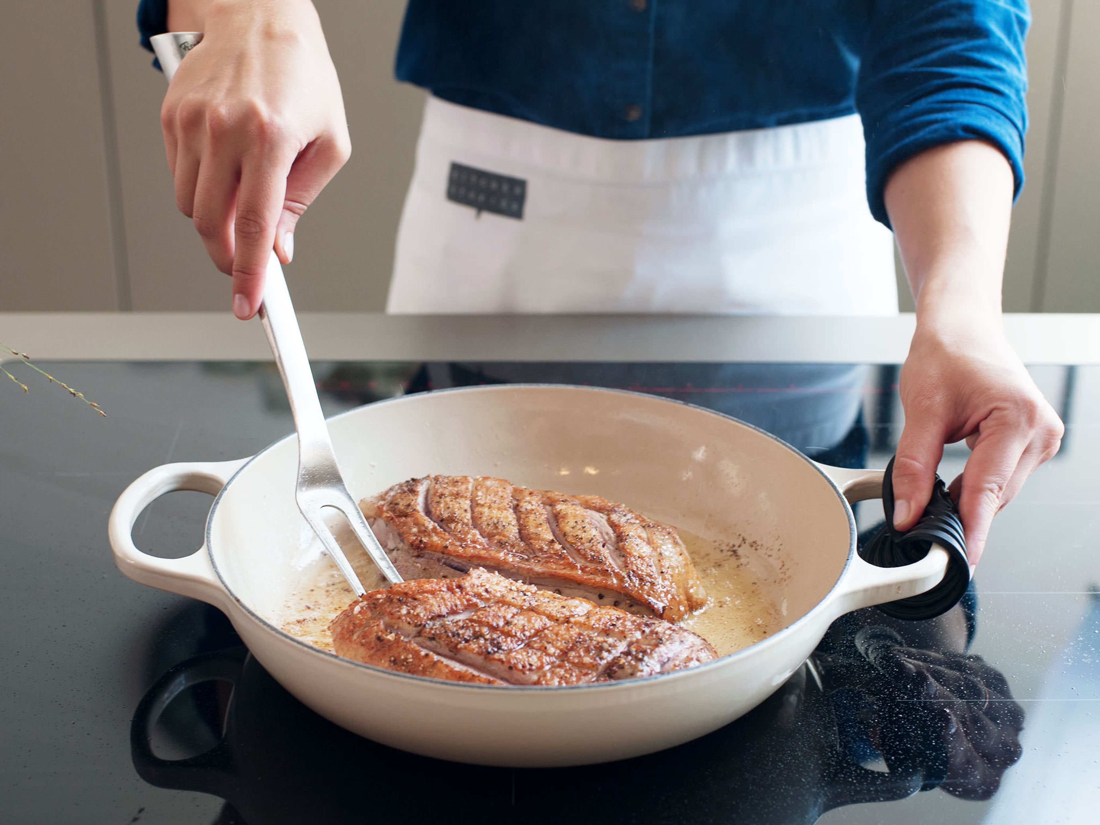 Heat a heavy-bottomed frying pan over medium-high heat. Add duck to pan, skin side-down, and cook until skin is browned and crisp, approx. 5 min. Reduce heat to medium, flip duck breasts, and cook until browned and cooked through, approx. 5 – 8 min.