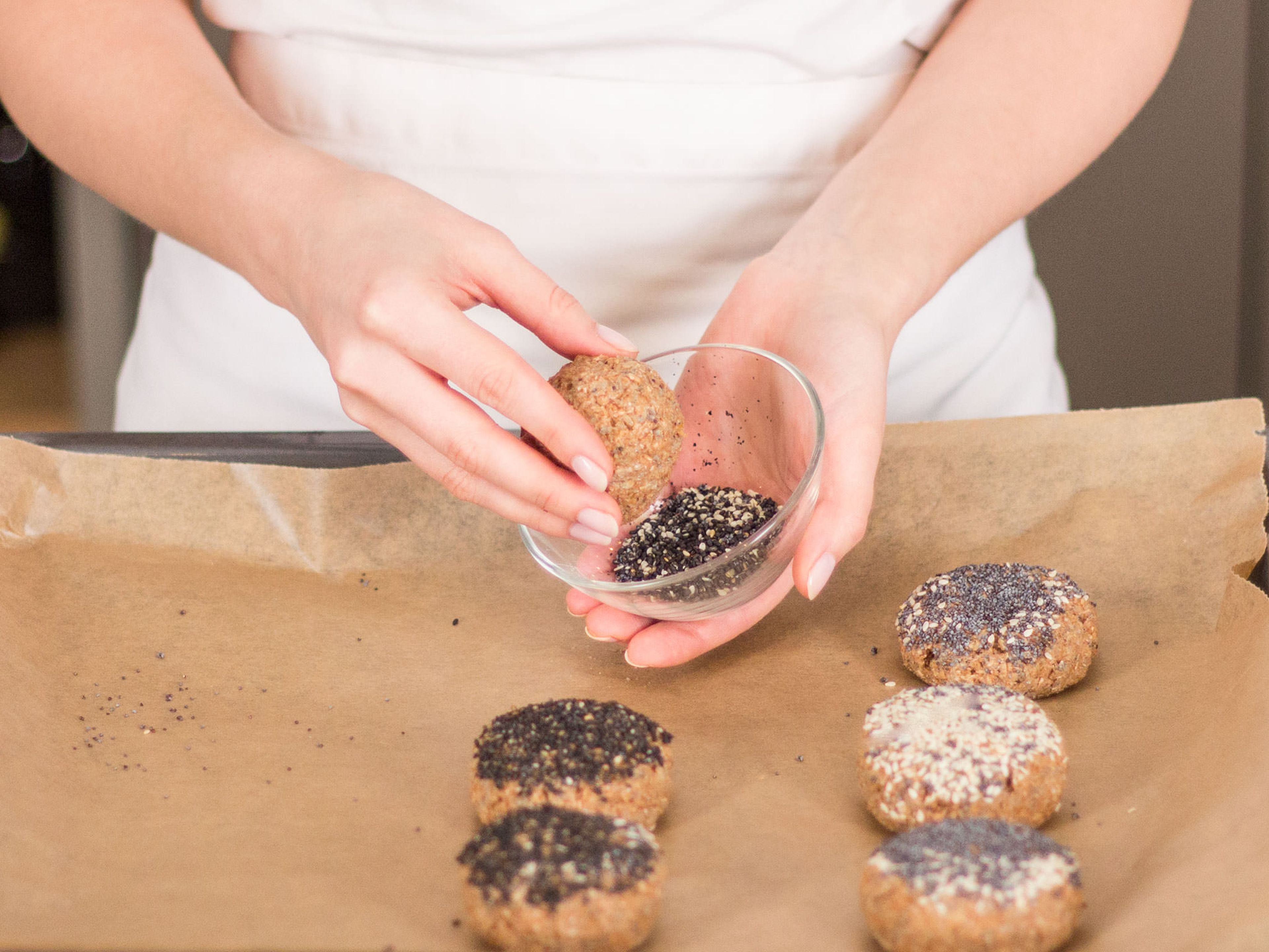 Form dough into balls and transfer to a parchment-lined baking sheet. Roll balls in black sesame, white sesame, or poppy seeds. Bake at 180°C/350°F for approx. 20 – 30 min. Enjoy!