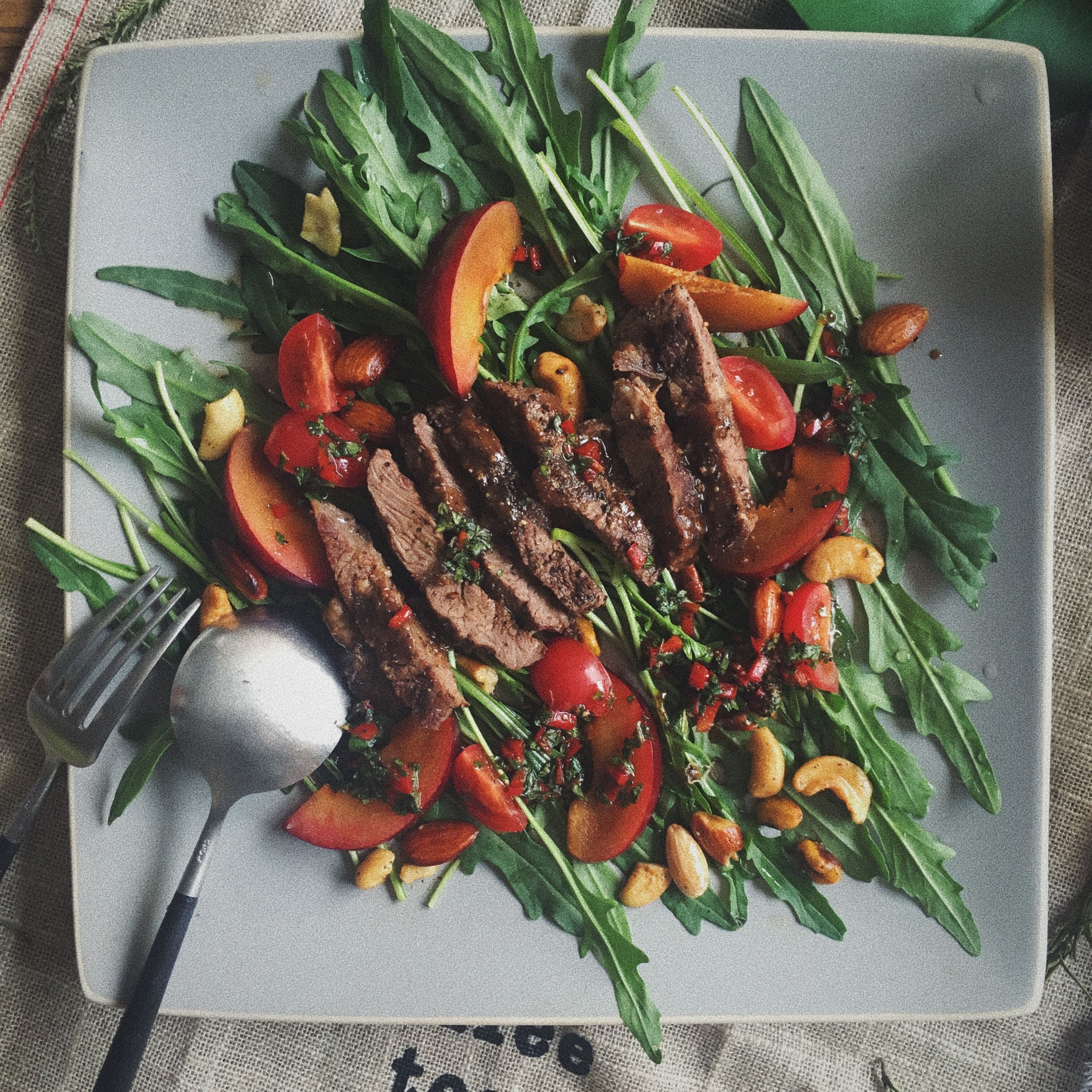 Summer salad with steak and nectarine
