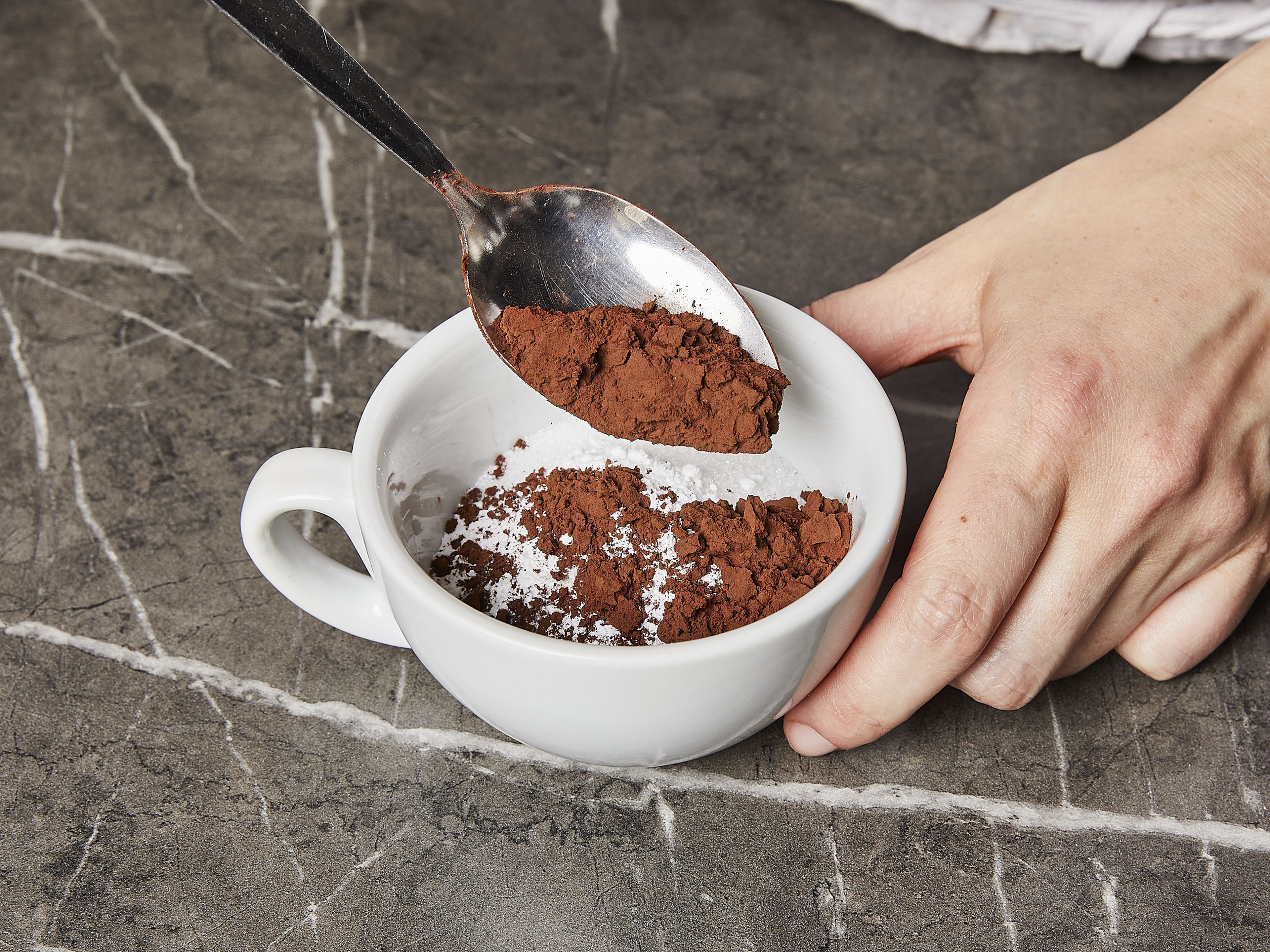 Mix flour, sugar, cocoa powder, baking powder, and salt in the mug.