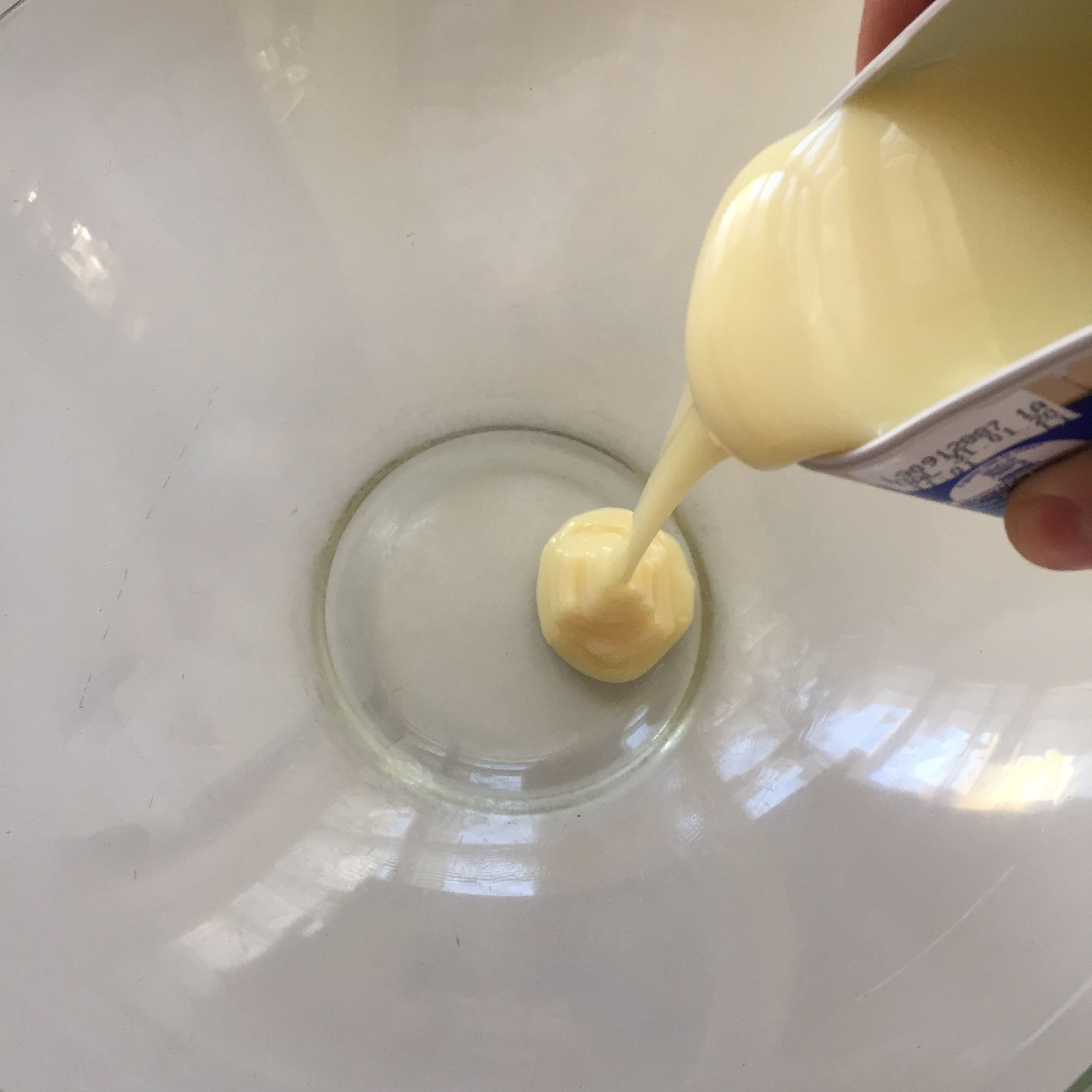 Pour the condensed milk into a bowl.