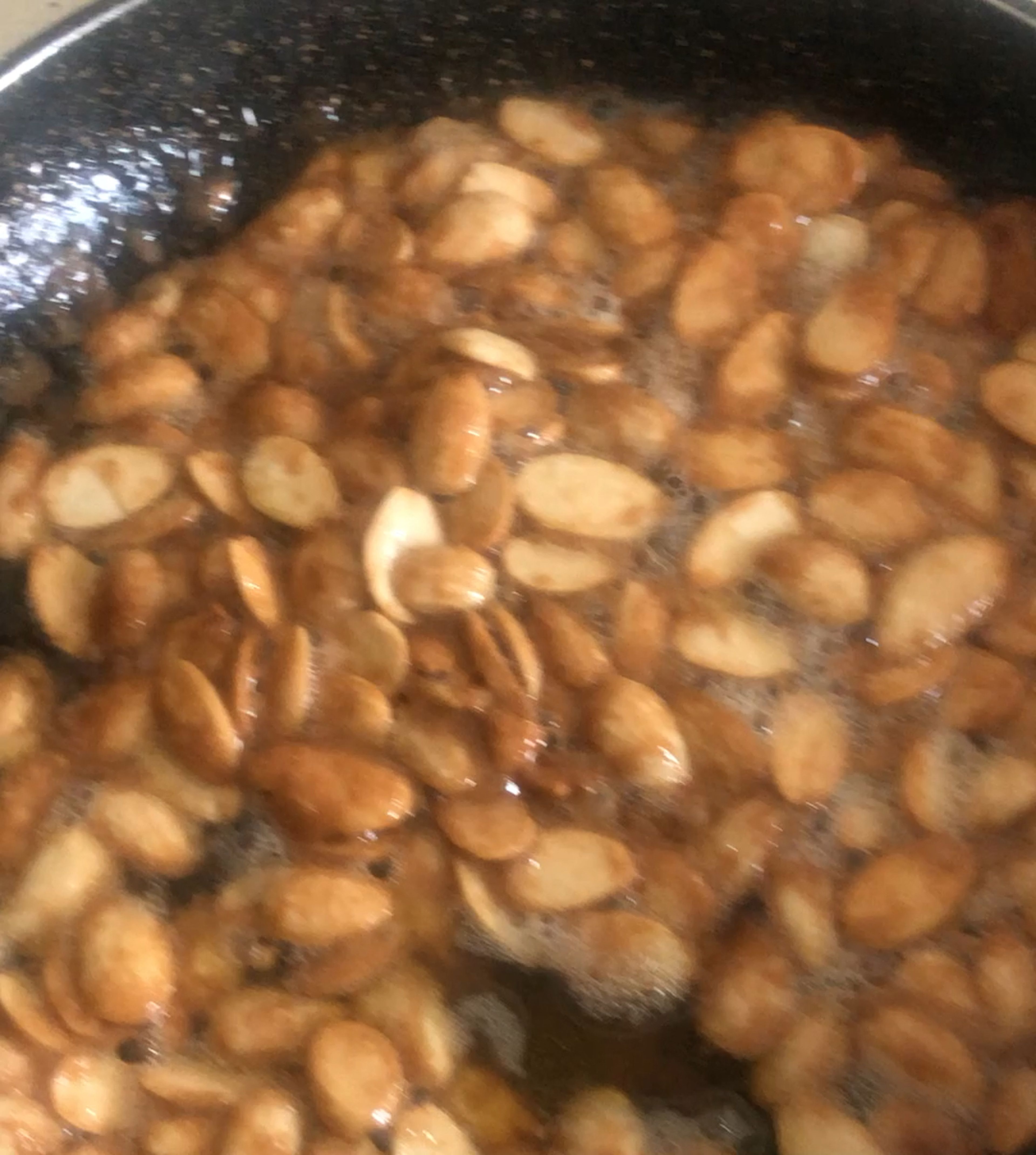 In a hot pan add butter, sugar, and almond. Mix well for couple of minutes until the almonds are gold. Once done, on a dish sprinkle some sugar ( sugar prevent the Caramelised almond to stick on the plate) and transfer the Caramelised almonds. And again sprinkle a bit of sugar on top to give them a crispy texture. Then Put aside.