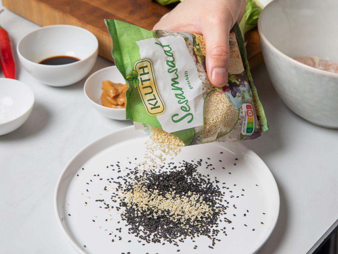 Crispy sesame chicken schnitzel with bok choy and peanut sauce Recipe