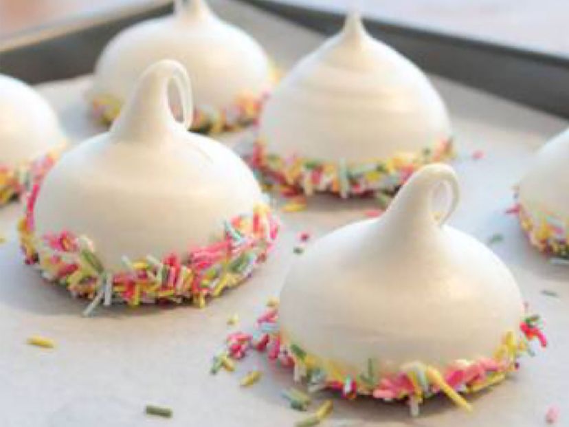 Sprinkle-dipped almond meringues