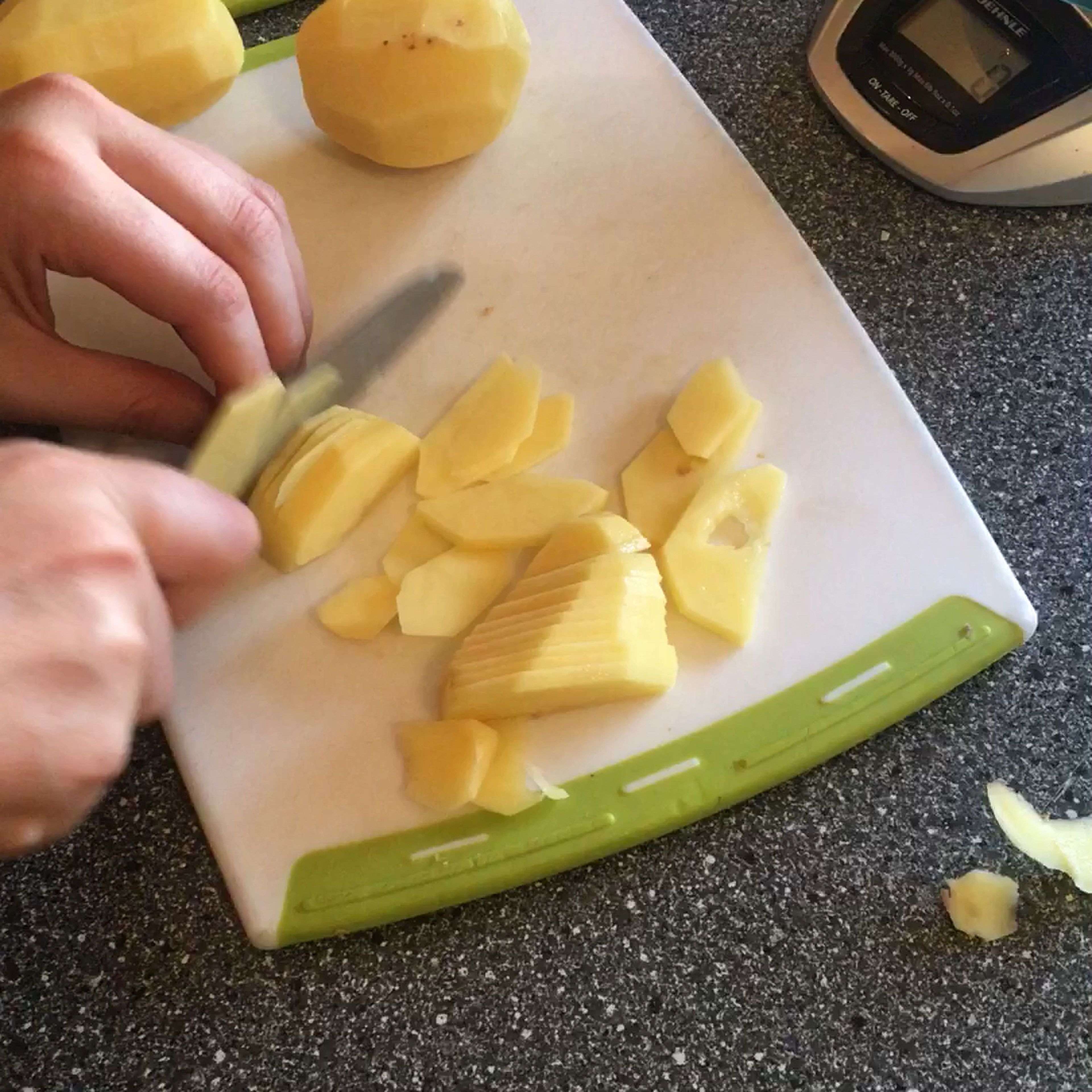 cut the potatoes into slices