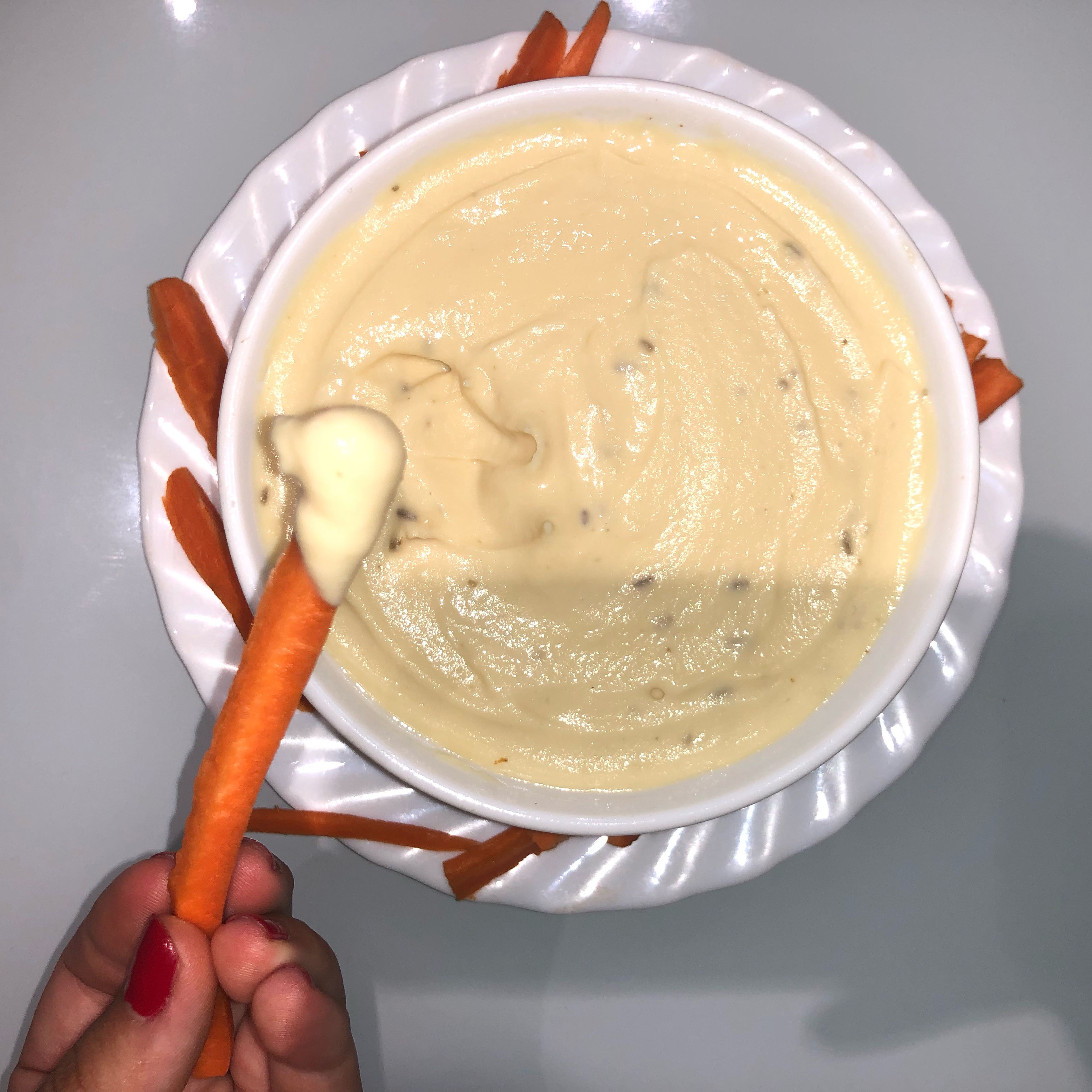 Chop some vegetables (carrots are my favourites), and dip them in your quick and delicious hummus!