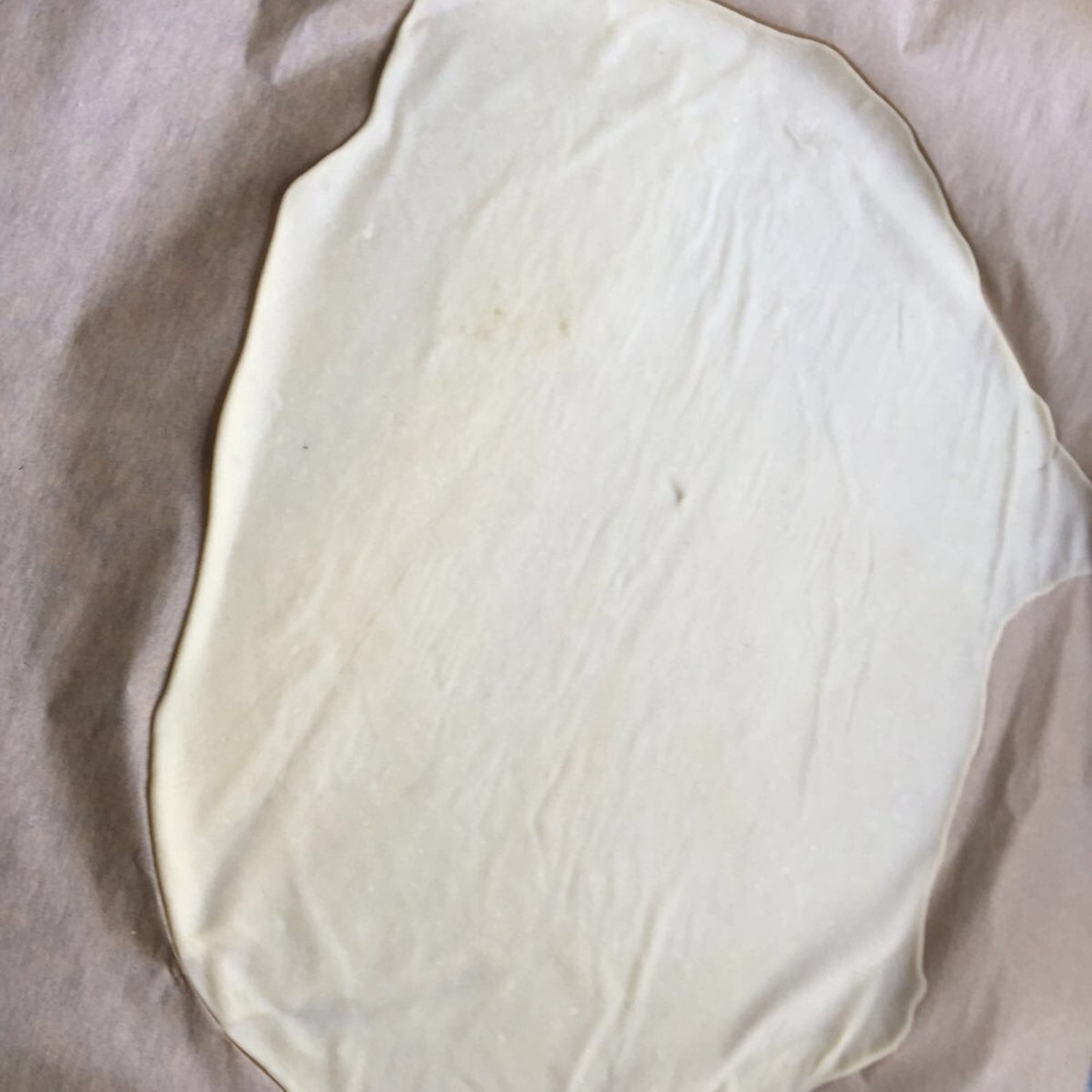Divide dough into 4 equal-sized portions and roll out thinly. Transfer to parchment paper and roll out again. Rest for 10 min. Meanwhile, preheat the oven to 180°C/350°F (convection).