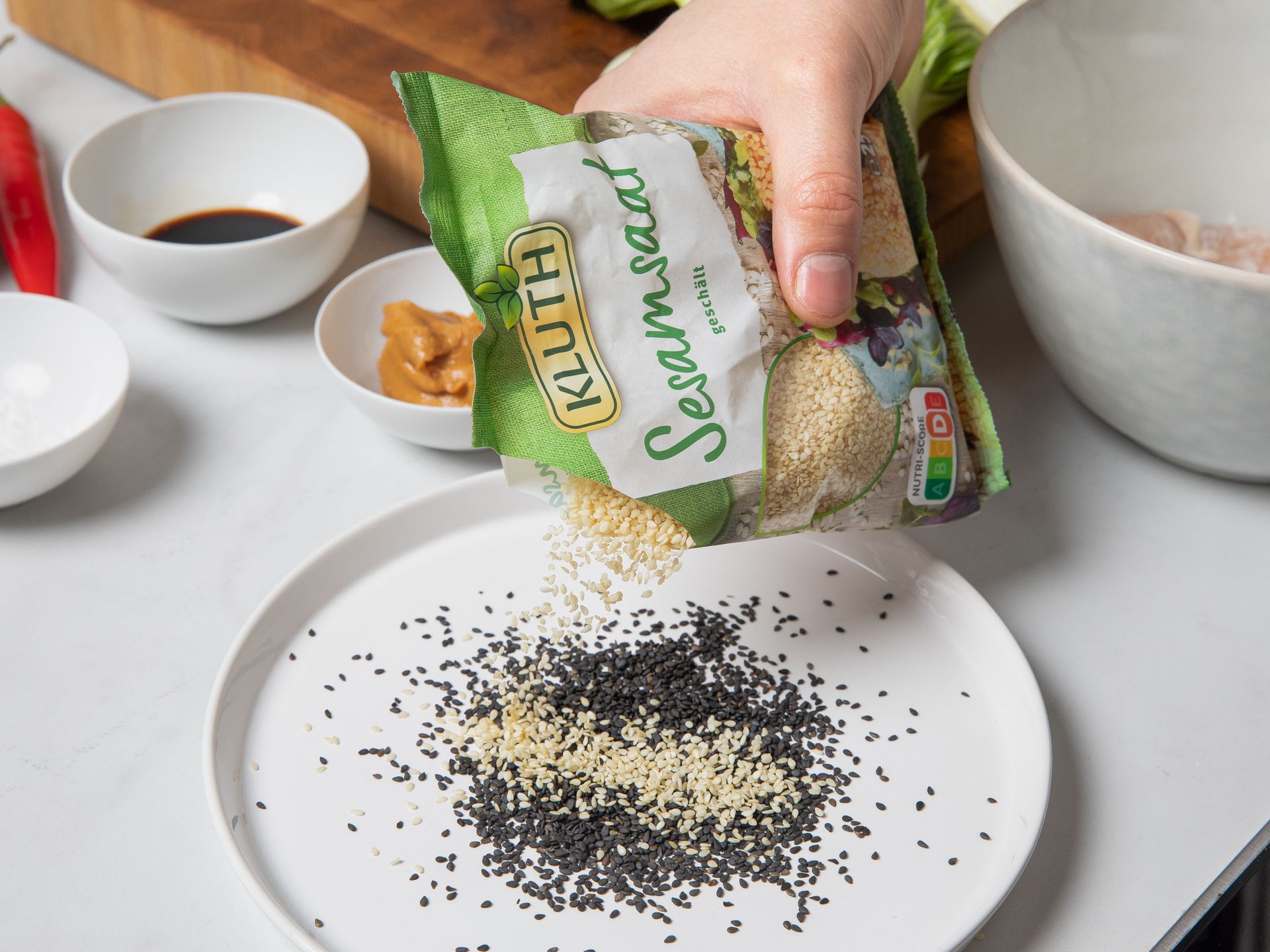 Crispy sesame chicken schnitzel with bok choy and peanut sauce Recipe