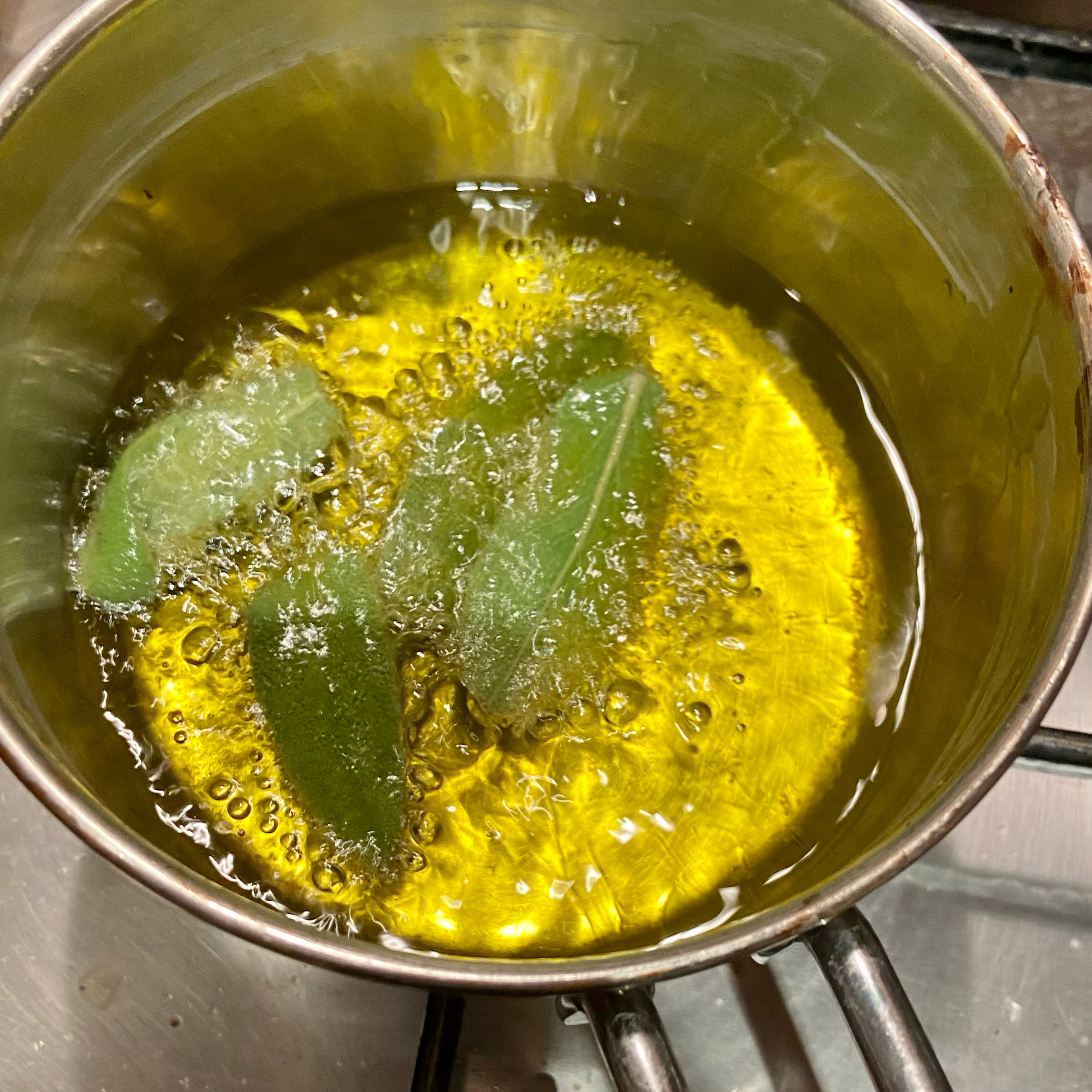 Optional - heat some oil on a saucer and quickly deep fry remaining sage leaves. It’s only takes seconds once oil is up to temperature.