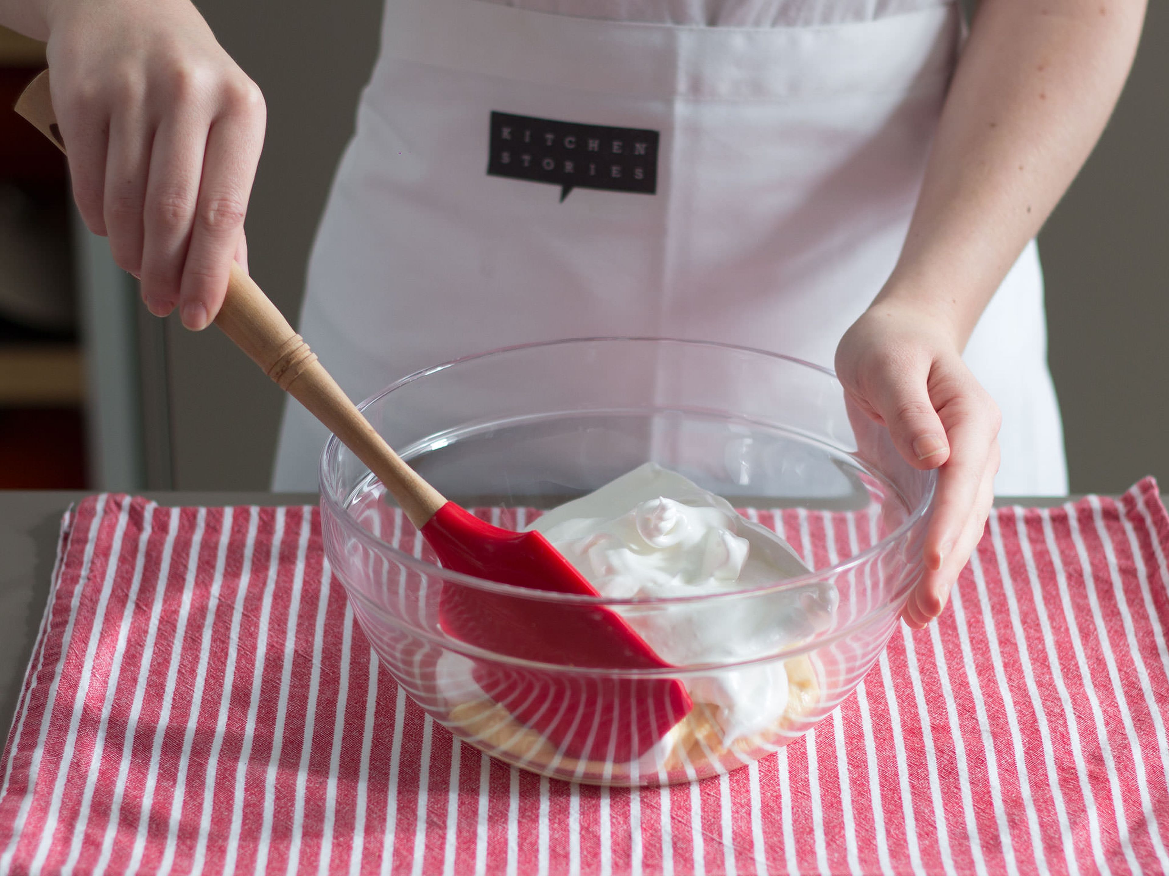 In a large bowl, fold egg whites and sugar into rest of the batter.