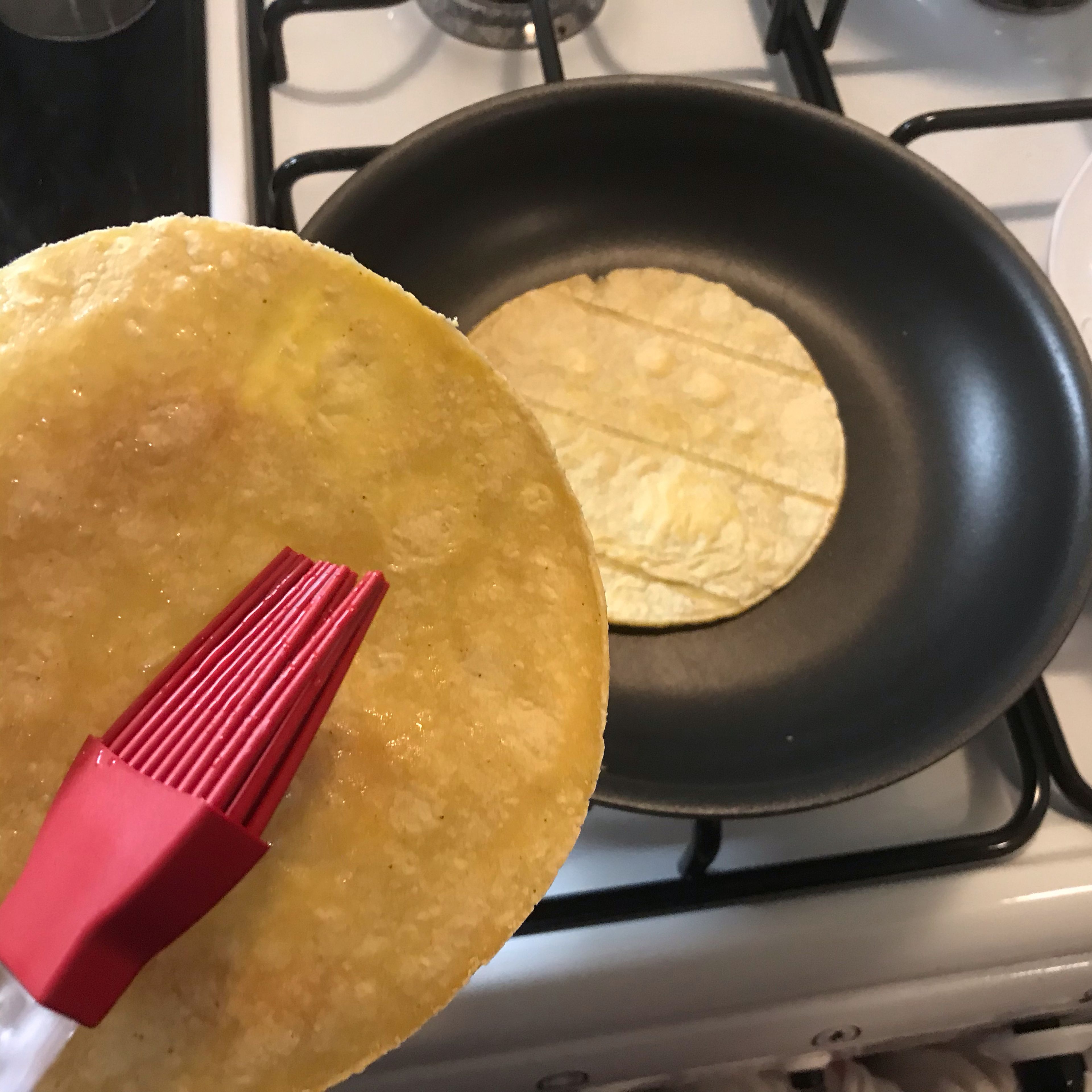 Warm the tortilla: Heat a non-stick skillet for 1 min. Put one tortilla in the pan and heat up each side for about 45 sec-1 min until the tortilla feels dryer and hardened. Repeat until all 3 tortilla are heated. OR, if you want to use oven it’s even better, warp them (up to 6 in one stack) in aluminum foil and to heat up at 350F for 10-12 min while doing next steps. Because I’m only making 3, I use the pan to do it quick and save energy.