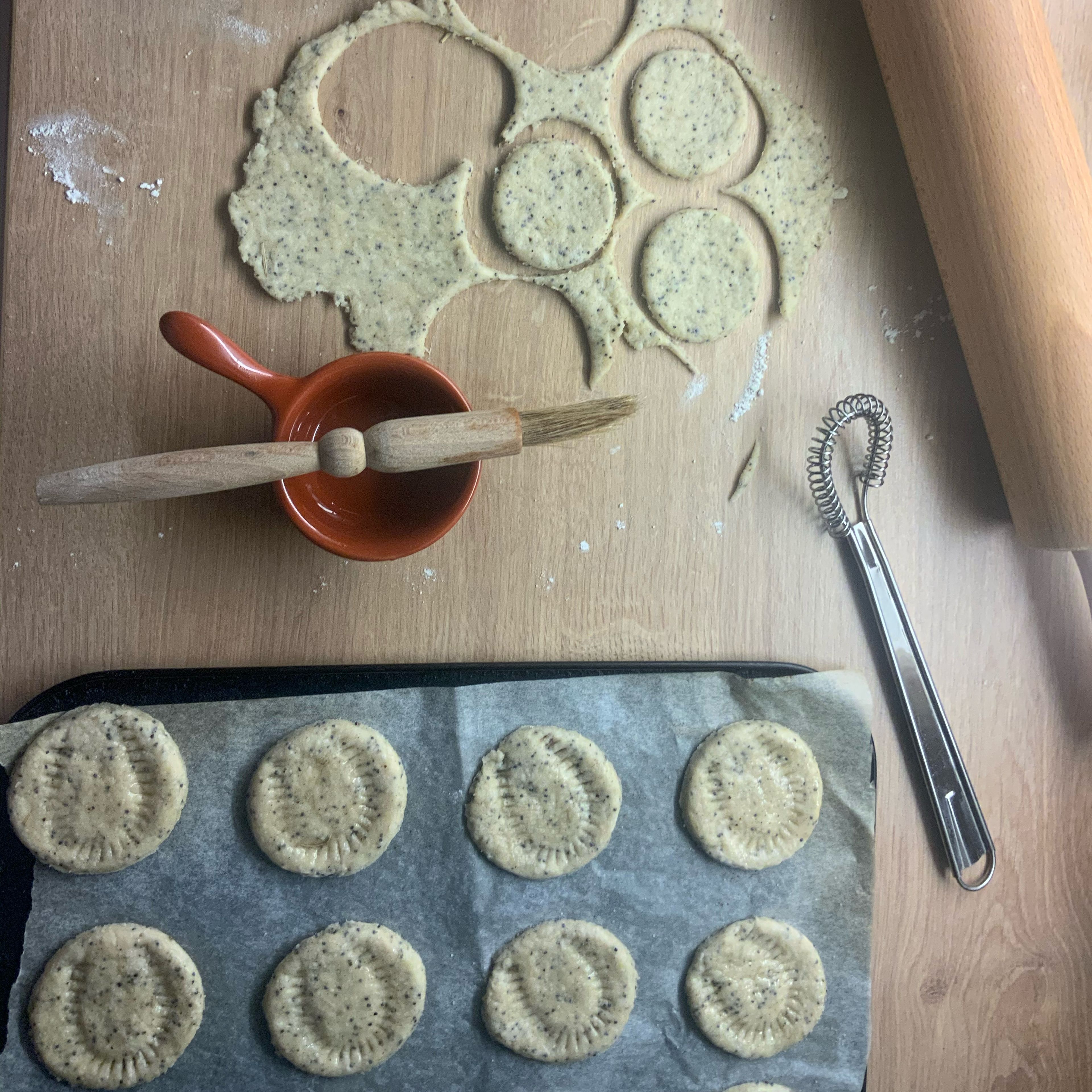 Roll the dough out onto a floured surface to desired thickness ( thicker= more bread like once baked, thinner= crisp bake ). Cut out with chosen shape and score/ mark. Place onto baking tray and brush with oil and sprinkle salt (optional)