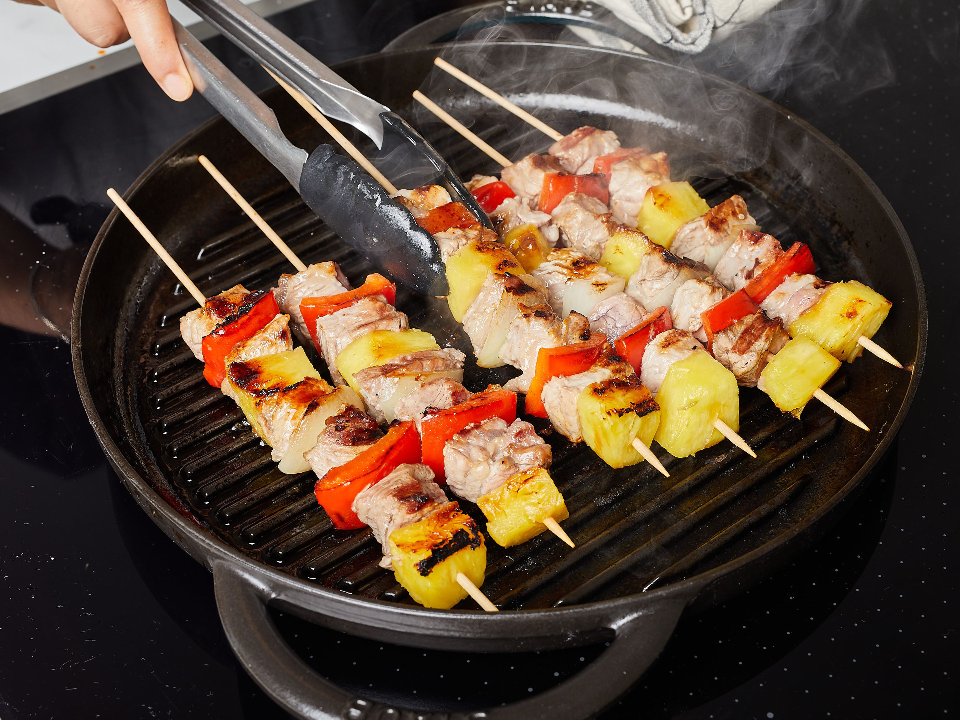 Meanwhile, heat the grill or grill pan. Season the skewers with a little salt and sear on all sides, about 3-4 mins. per side, until the meat is cooked through. Serve the skewers alongside the sauce and enjoy!