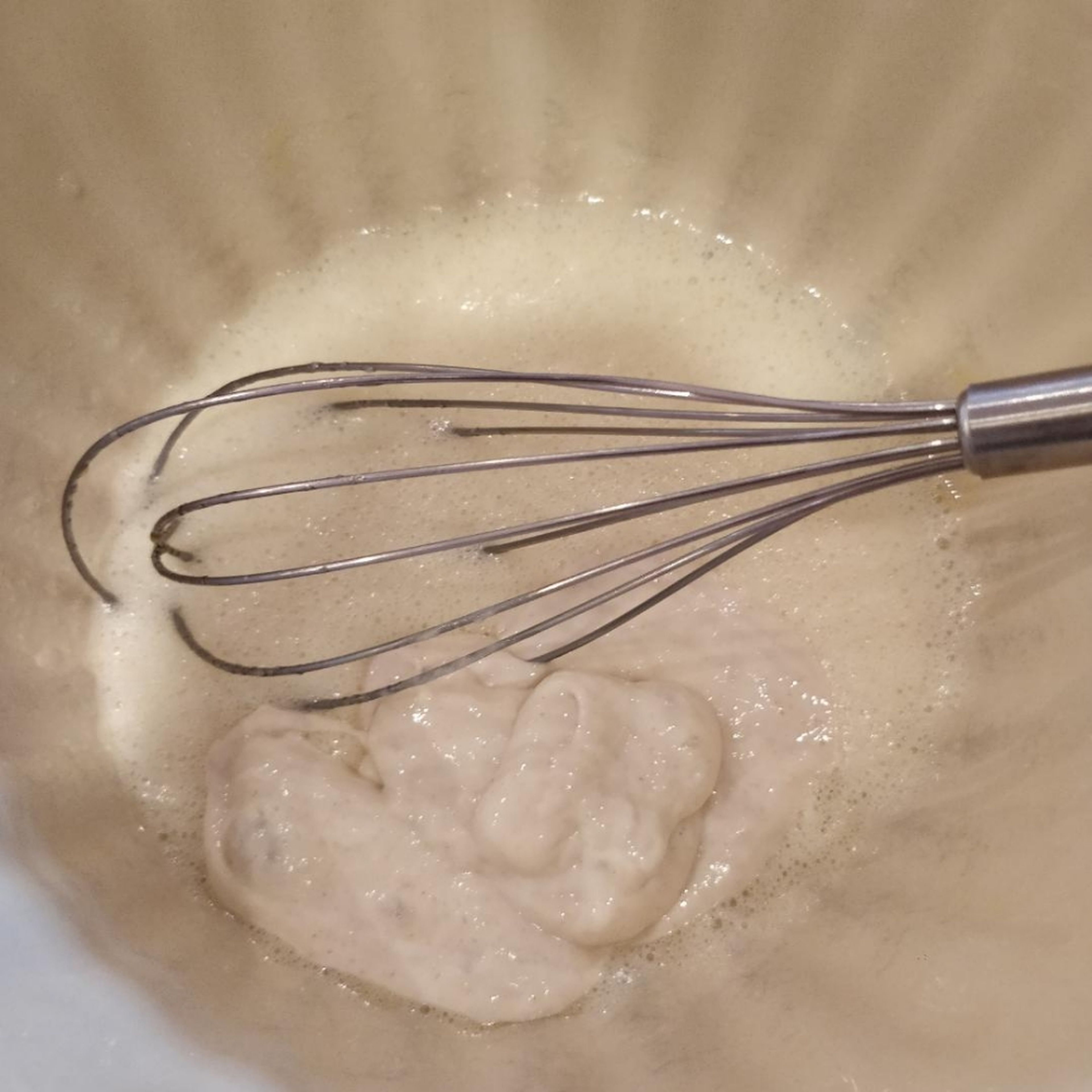 Whisk in the sourdough discard until you have a smooth batter