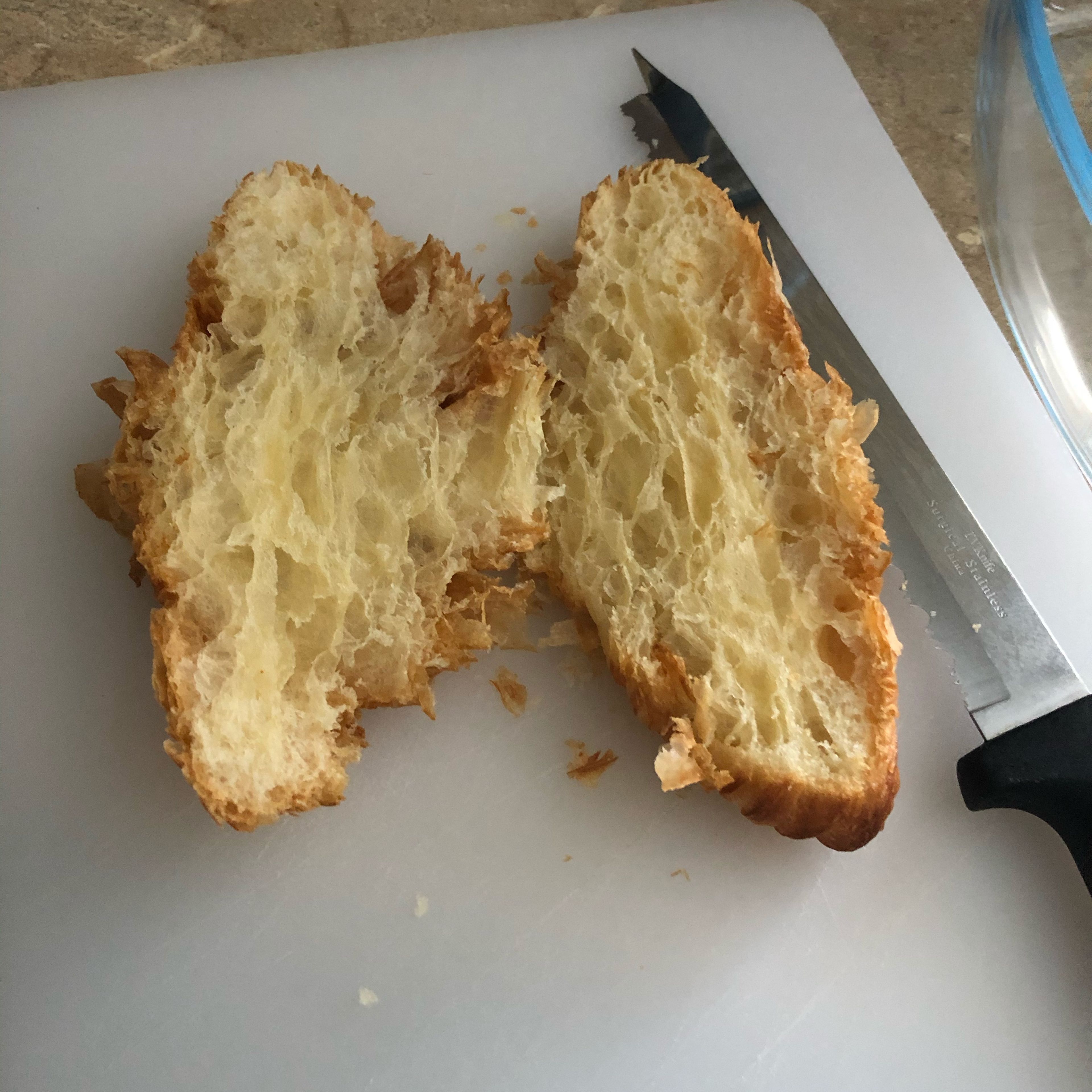 Cut croissants in half.