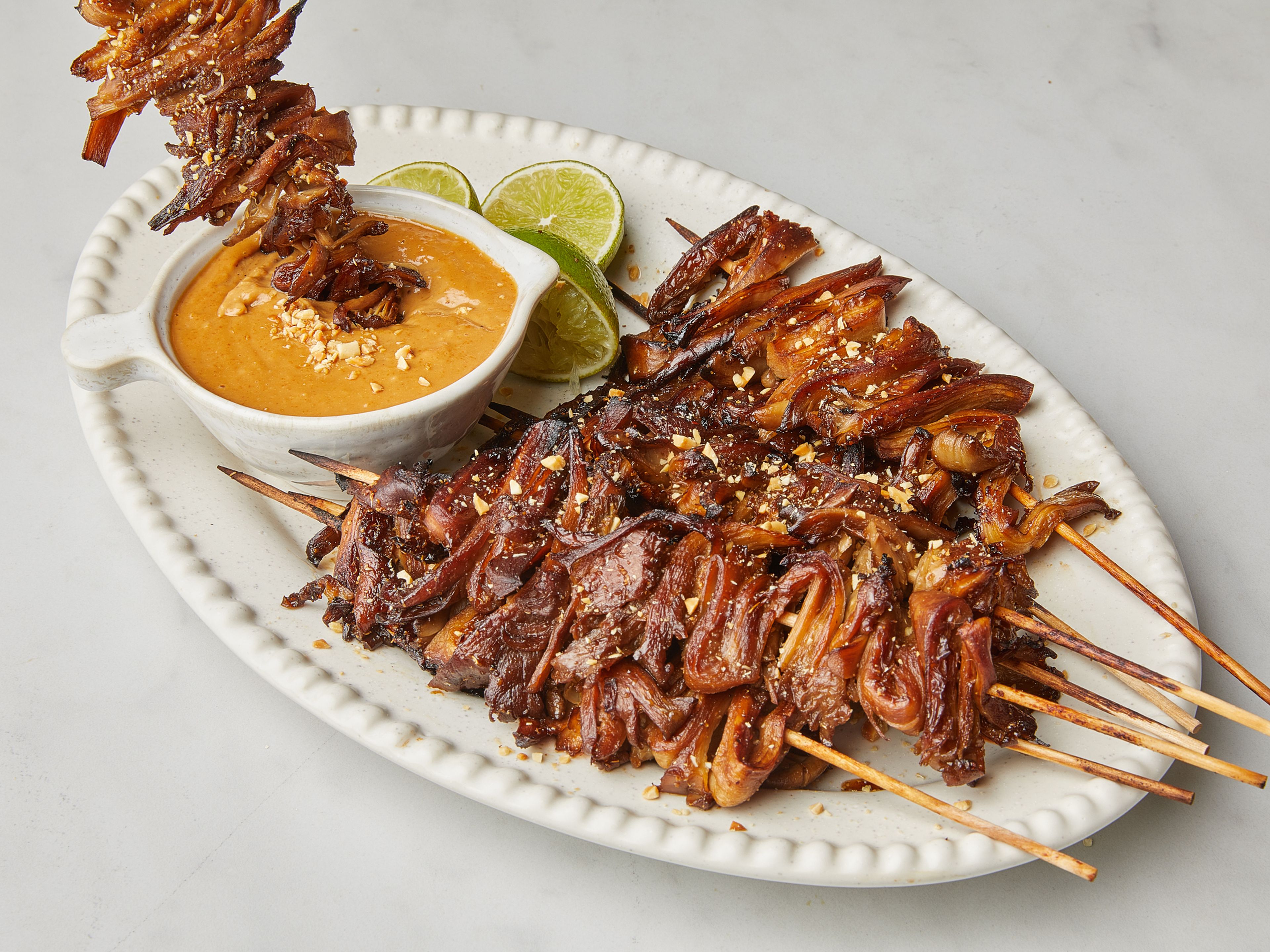 Oyster mushroom satay with spicy peanut sauce