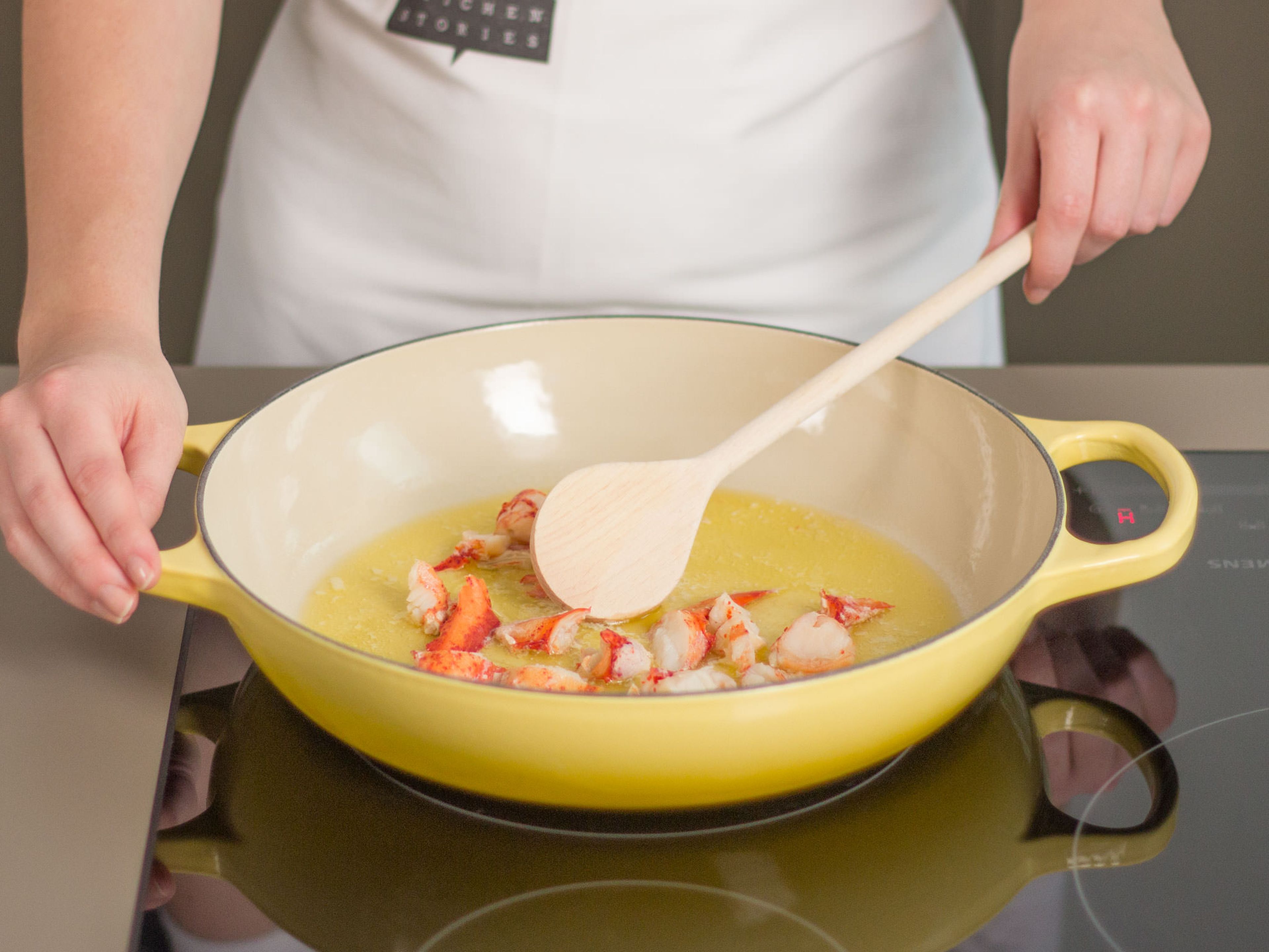 In a large frying pan, sauté lobster in butter over medium heat for approx. 3 – 5 min.