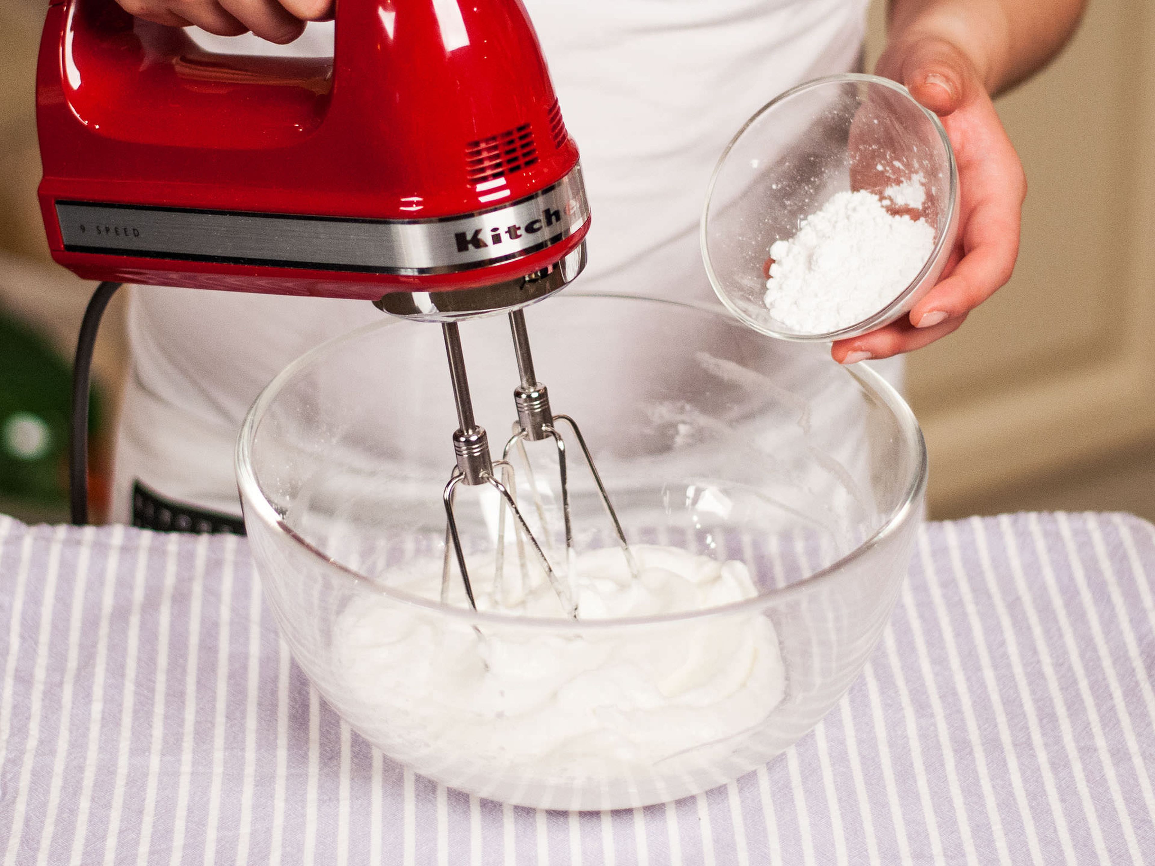 For the cream cheese topping, whisk together cream cheese, melted butter, lemon juice, and remaining vanilla extract until smooth. Then stir in confectioner’s sugar little by little. Frost cooled cake with the topping and serve with some whipped cream to taste.