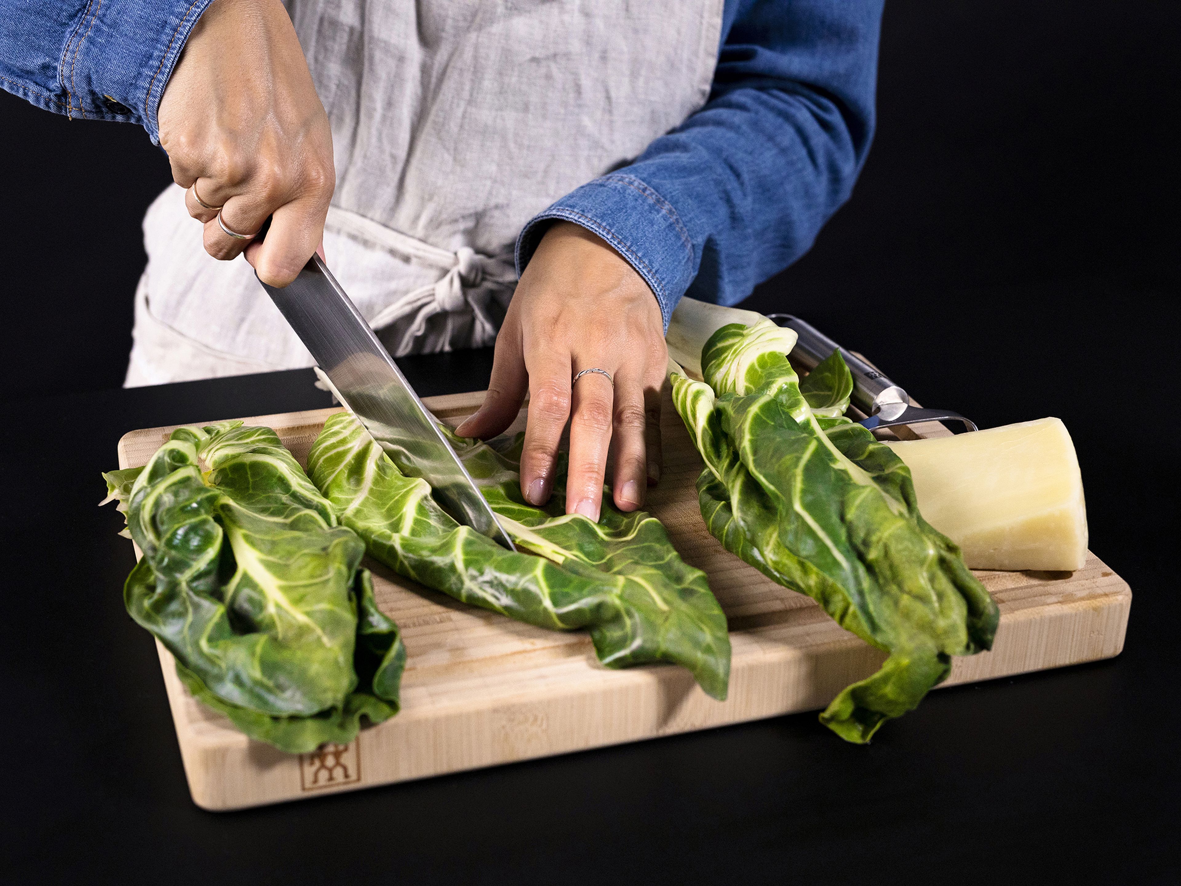 Remove the stems from the swiss chard and cut the leaves into large pieces. Use a vegetable peeler to shave pecorino into thin slices.
