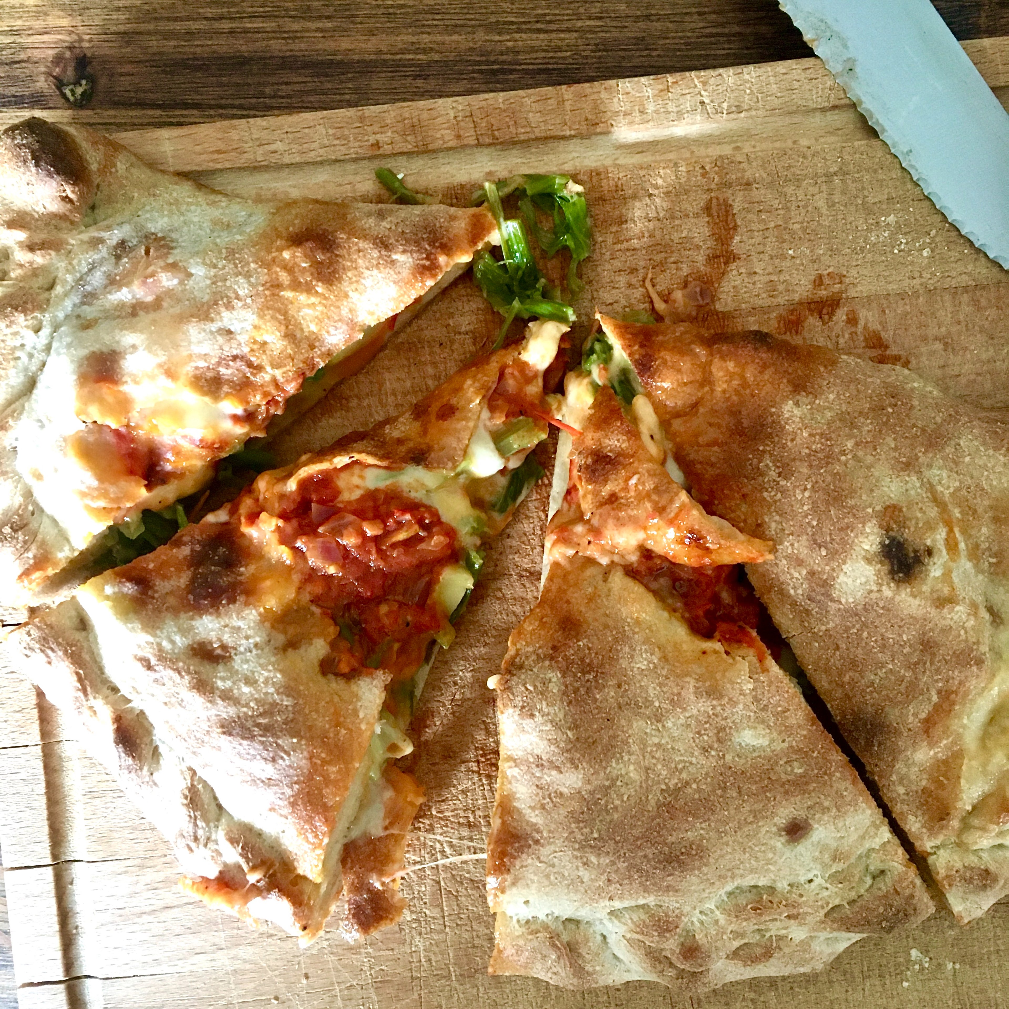 Spinach-Zucchini Calzone with Hot Tomato Sauce