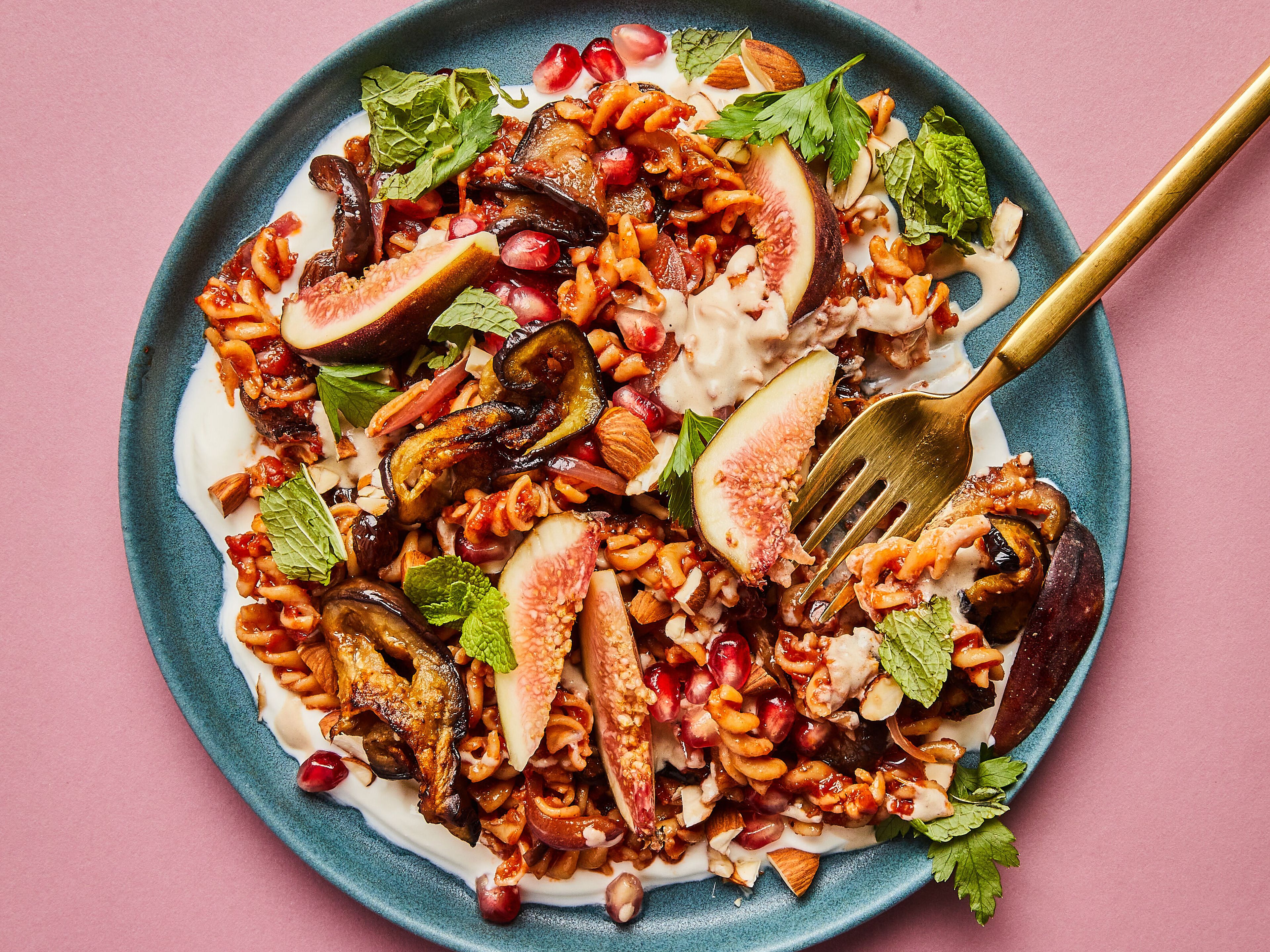 Chickpea pasta salad with eggplant and pomegranate