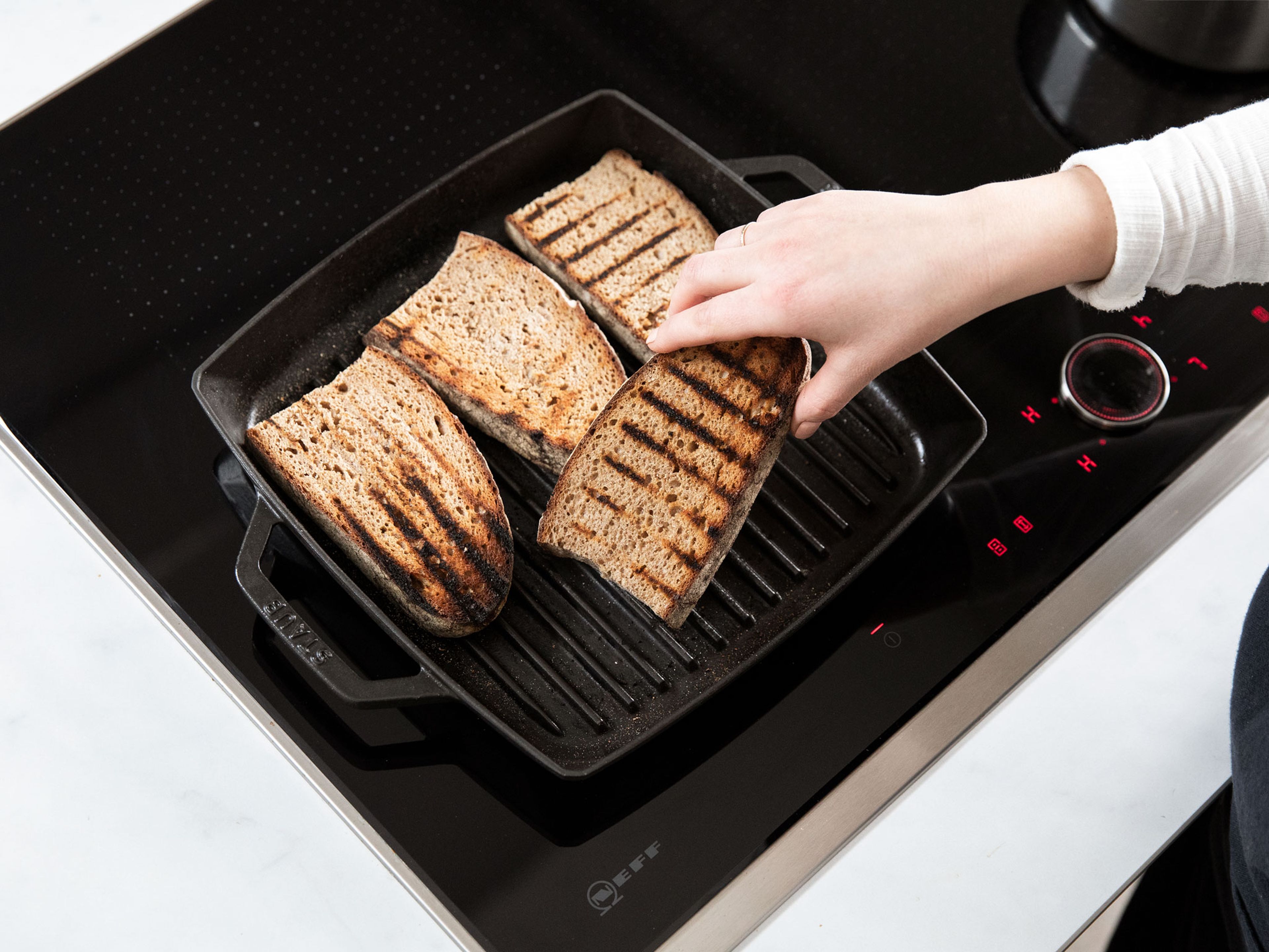 Toast sourdough bread in a grill pan.
