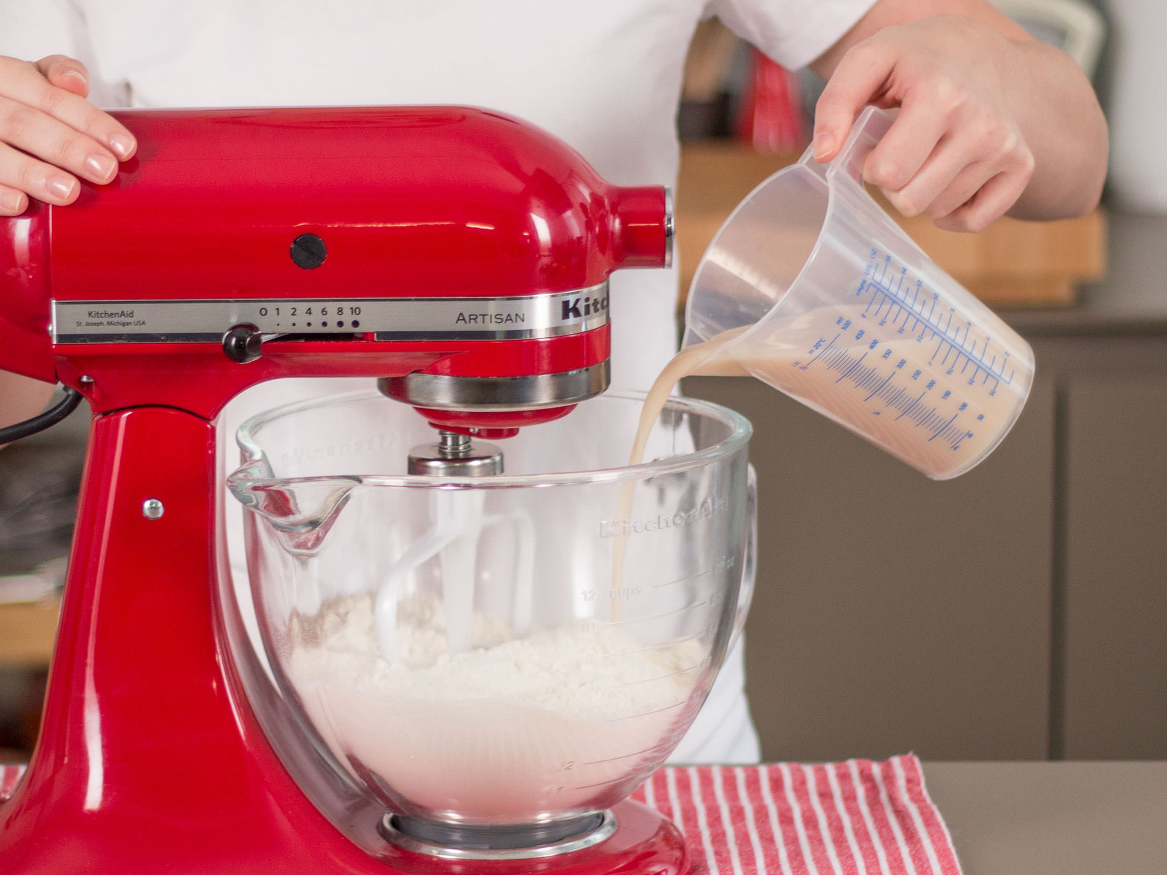 Dissolve yeast and part of sugar in lukewarm water and then add mixture to a standing mixer with flour. Beat until a smooth, even dough forms. Cover and let rise in a warm place for approx. 15 – 20 min. until dough has doubled in volume.