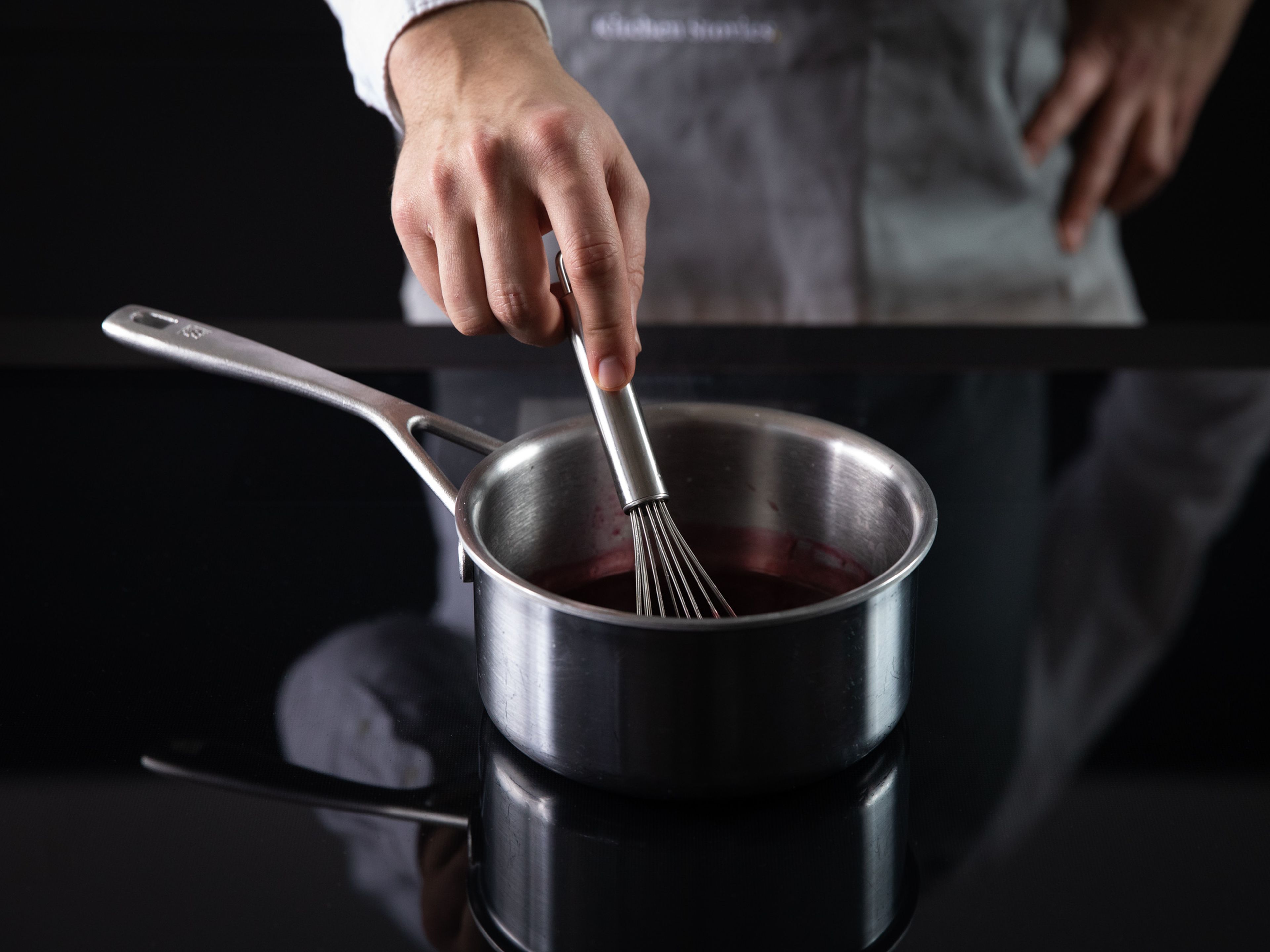 Heat a saucepan over medium-high heat and add some sugar. Let caramelize. Add liquid from jarred sour cherries. Dissolve starch in water, then slowly whisk in to the saucepan. Once thickened, add sour cherries.