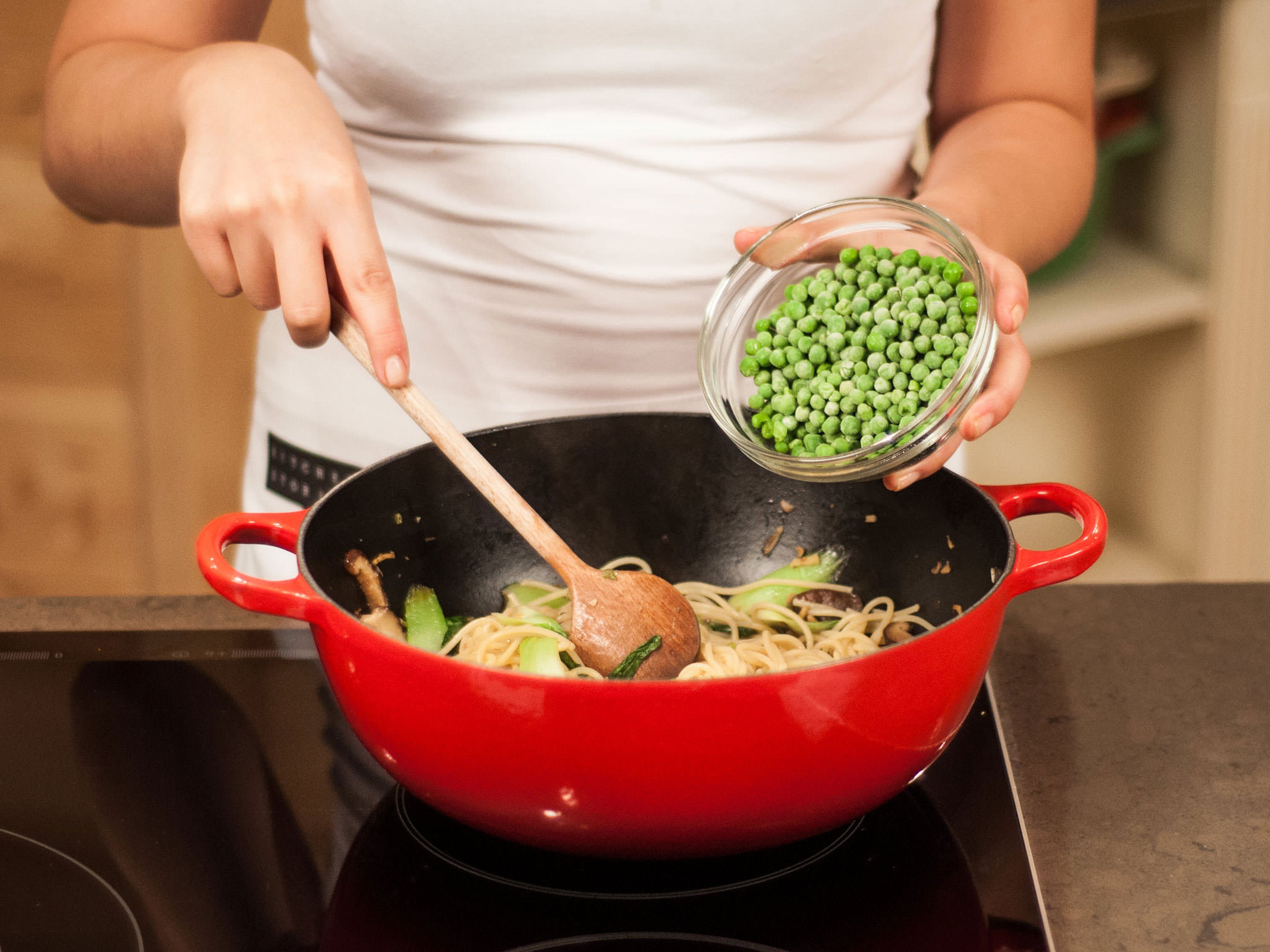Return noodles to pan. Add sesame oil and peas to pan. Continue to sauté for approx. 4 – 6 min., stirring well to combine. Season to taste once more with salt and pepper. Enjoy as a healthy lunch!