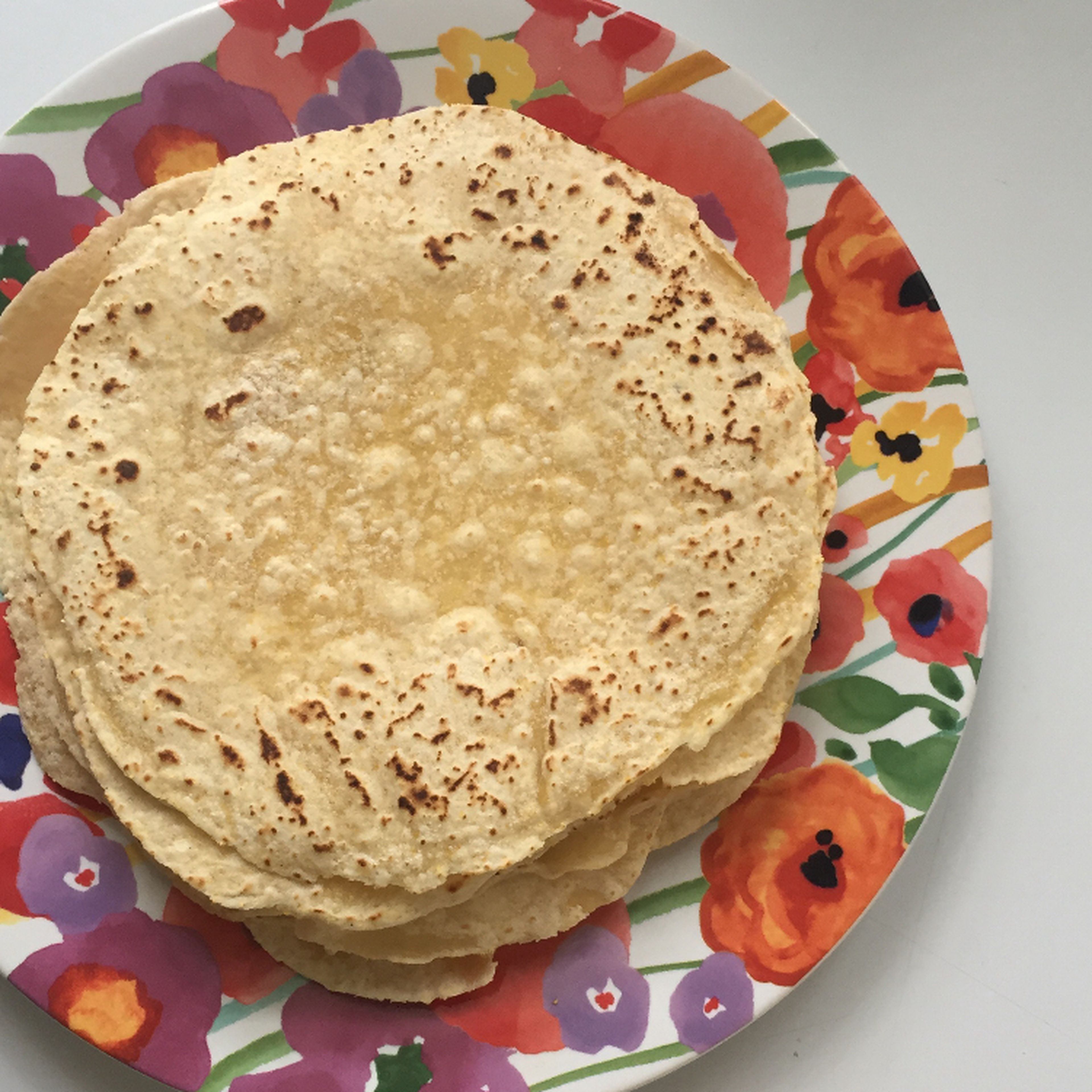 repeat step six with all the tortillas. Let cool for a few minutes then place in a plastic bag or tupper while still warm. This will keep the humidity in your tortillas until serving time. Serve and enjoy!