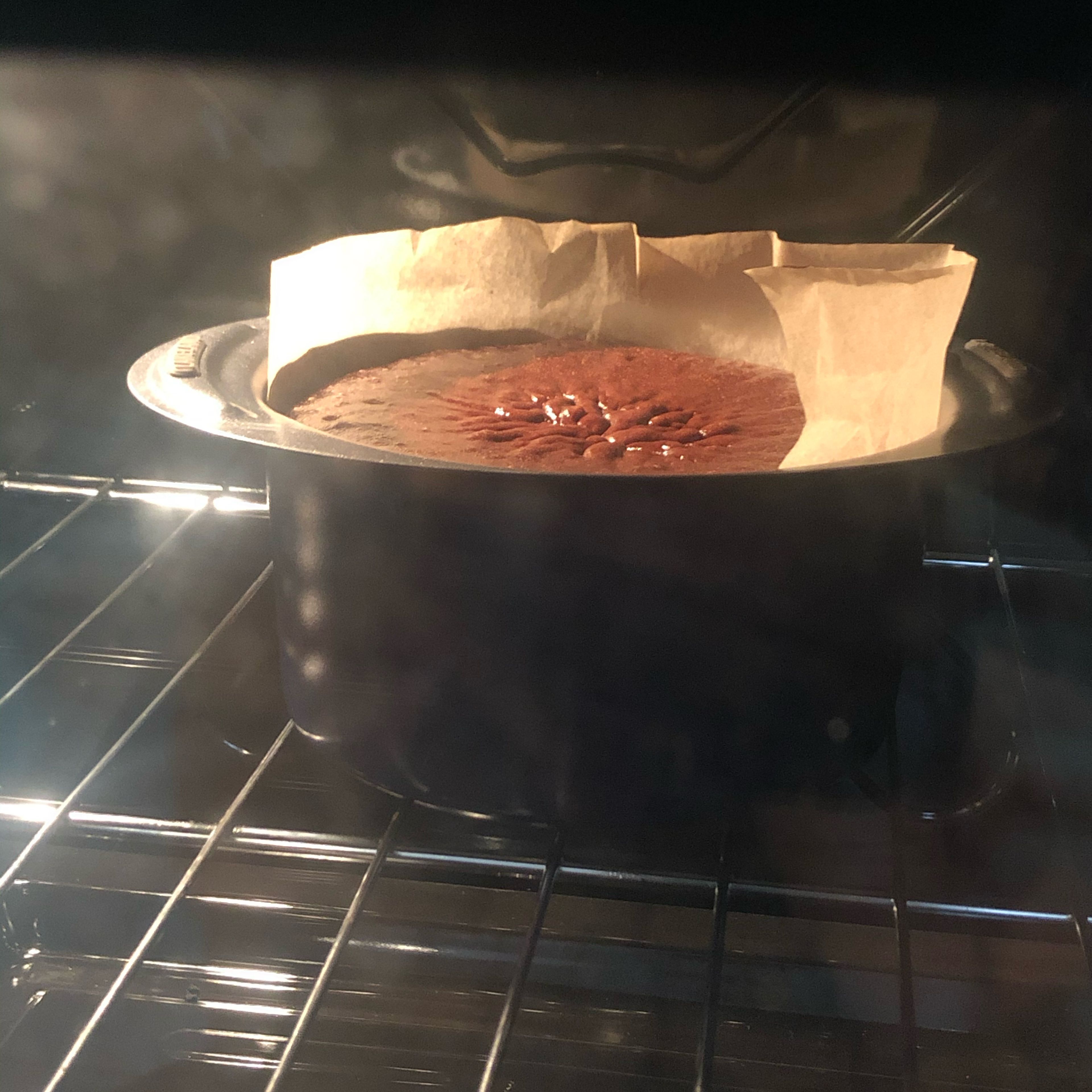 Place the cake in the oven and set the timer for 30 mins in 180 degree celcius