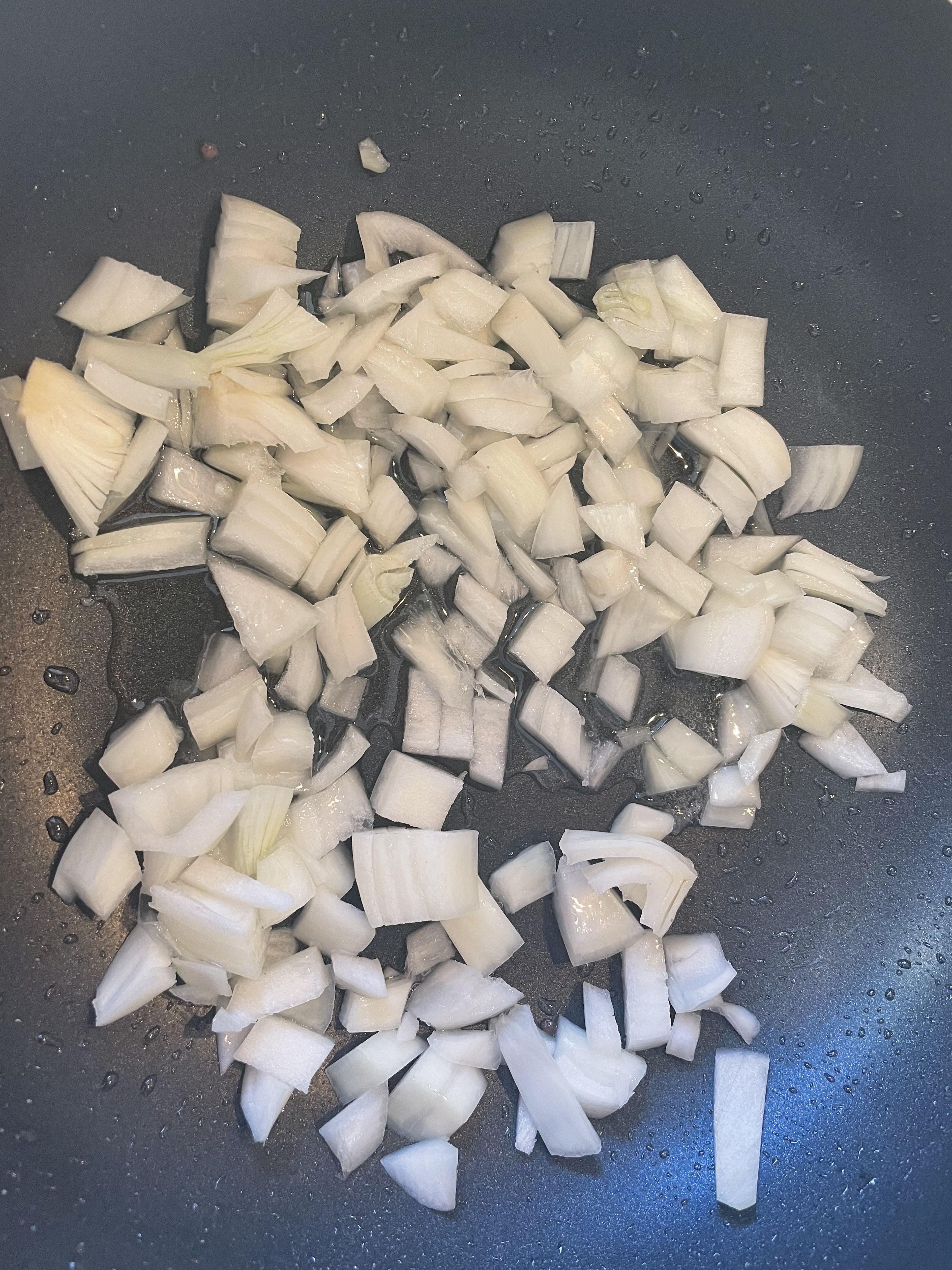 Once you have done the mince, chop your onion into dice or how ever you like, add some olive oil to the frying pan and fry your onions until transparent not browned. 