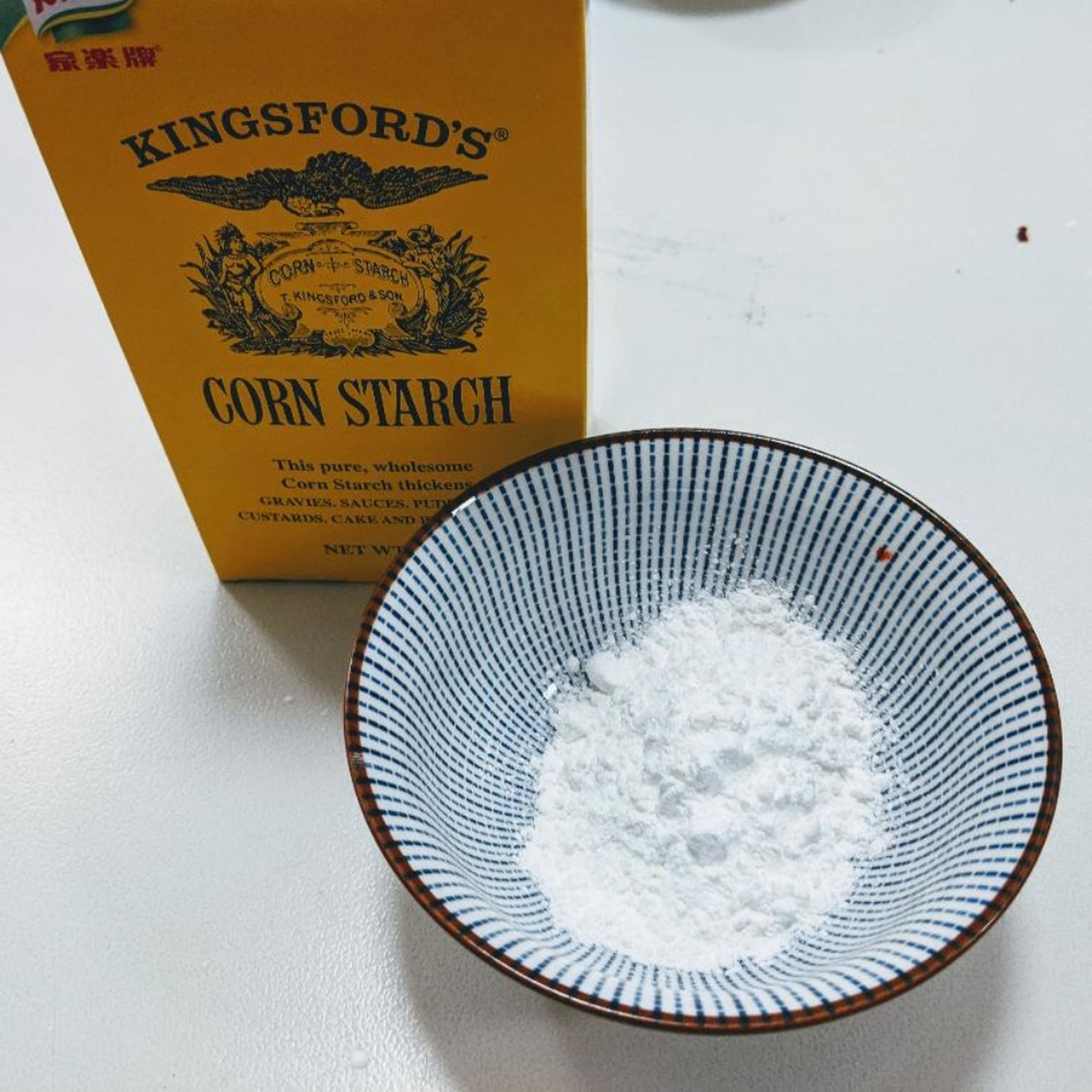 pour some corn starch in into a separate bowl.