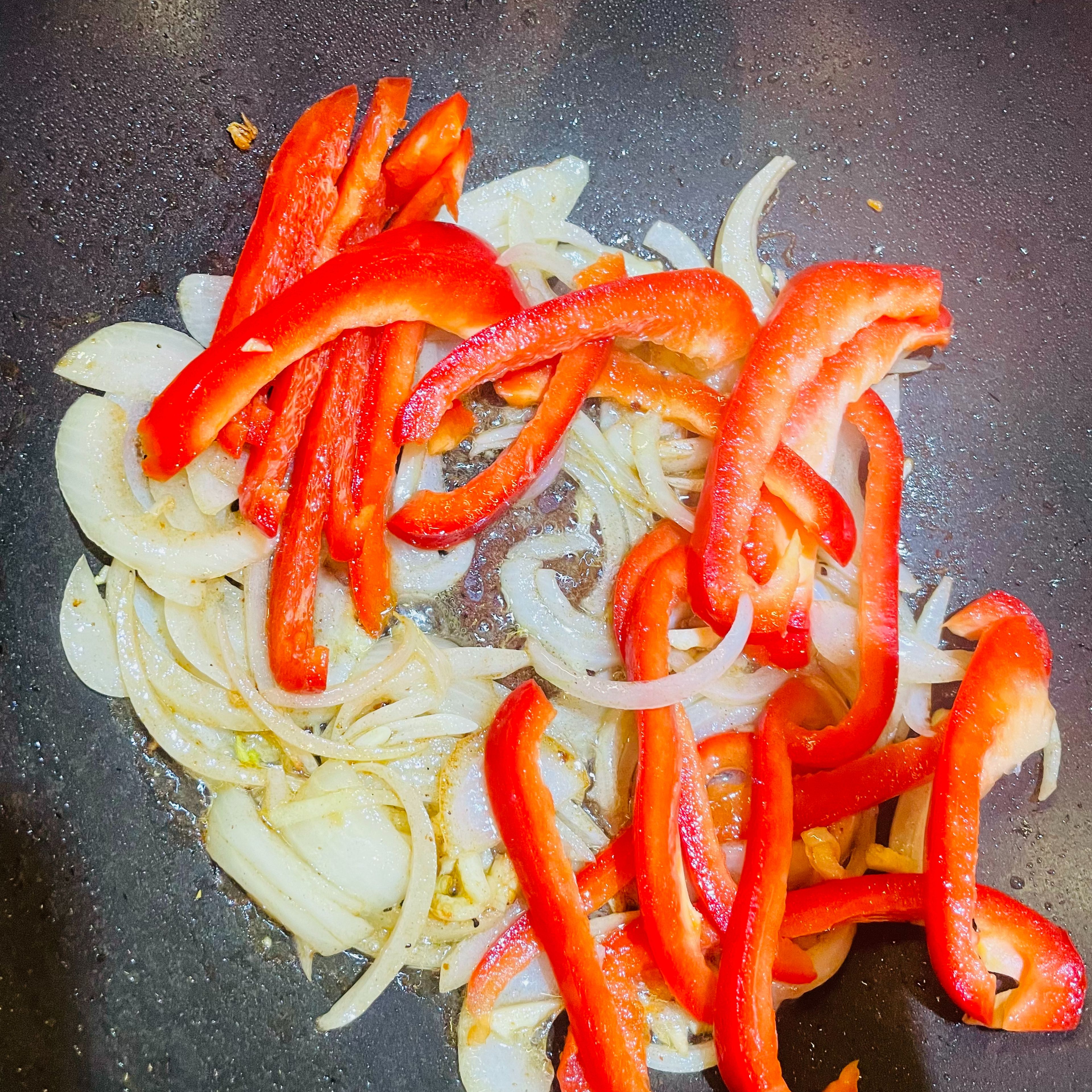 Remove chicken, set aside. In the same pan, add 2 tbsp olive oil, onion, garlic, and red bell pepper until softened
