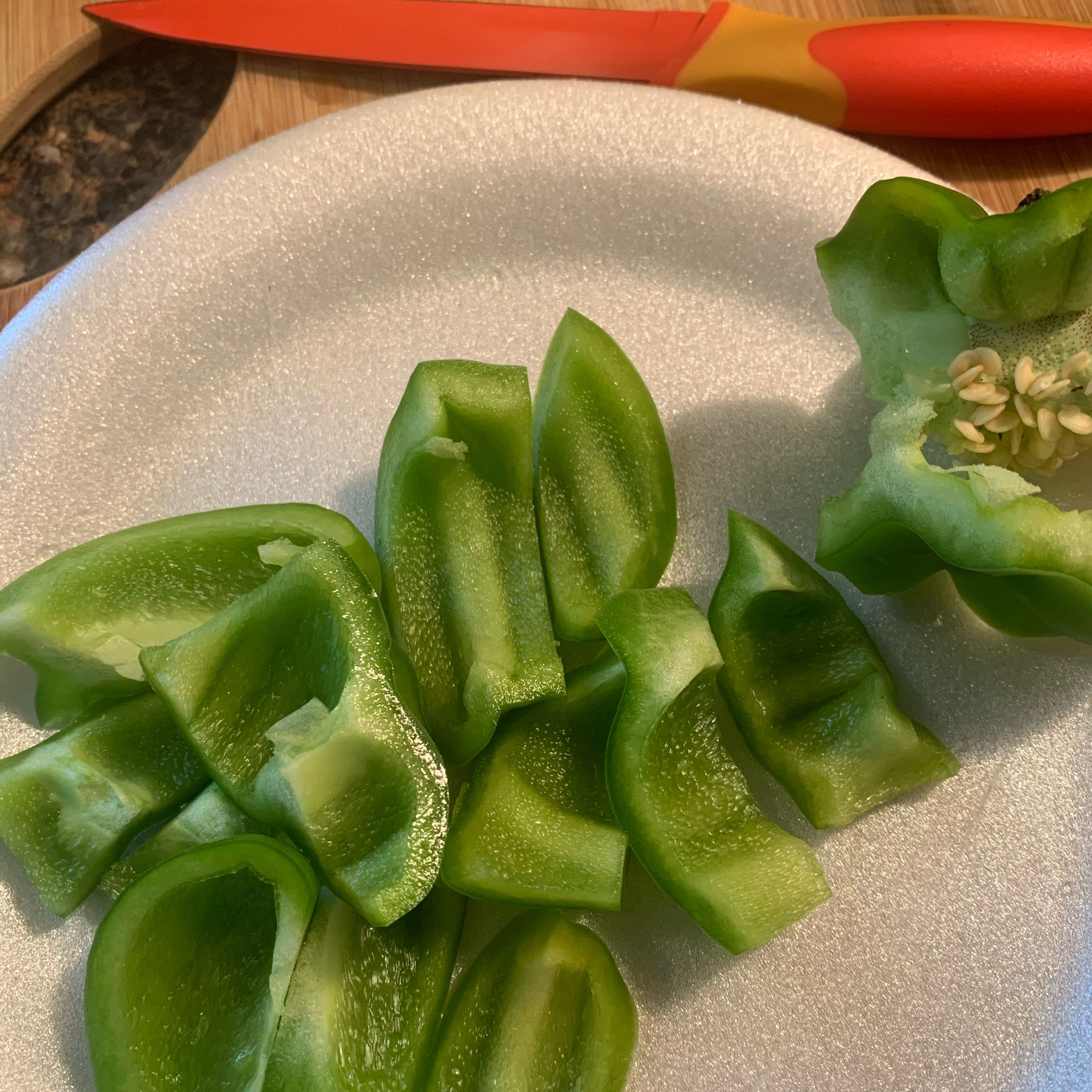 Chop bell peppers into large pieces making sure no ribs or seeds are intact and then set aside.