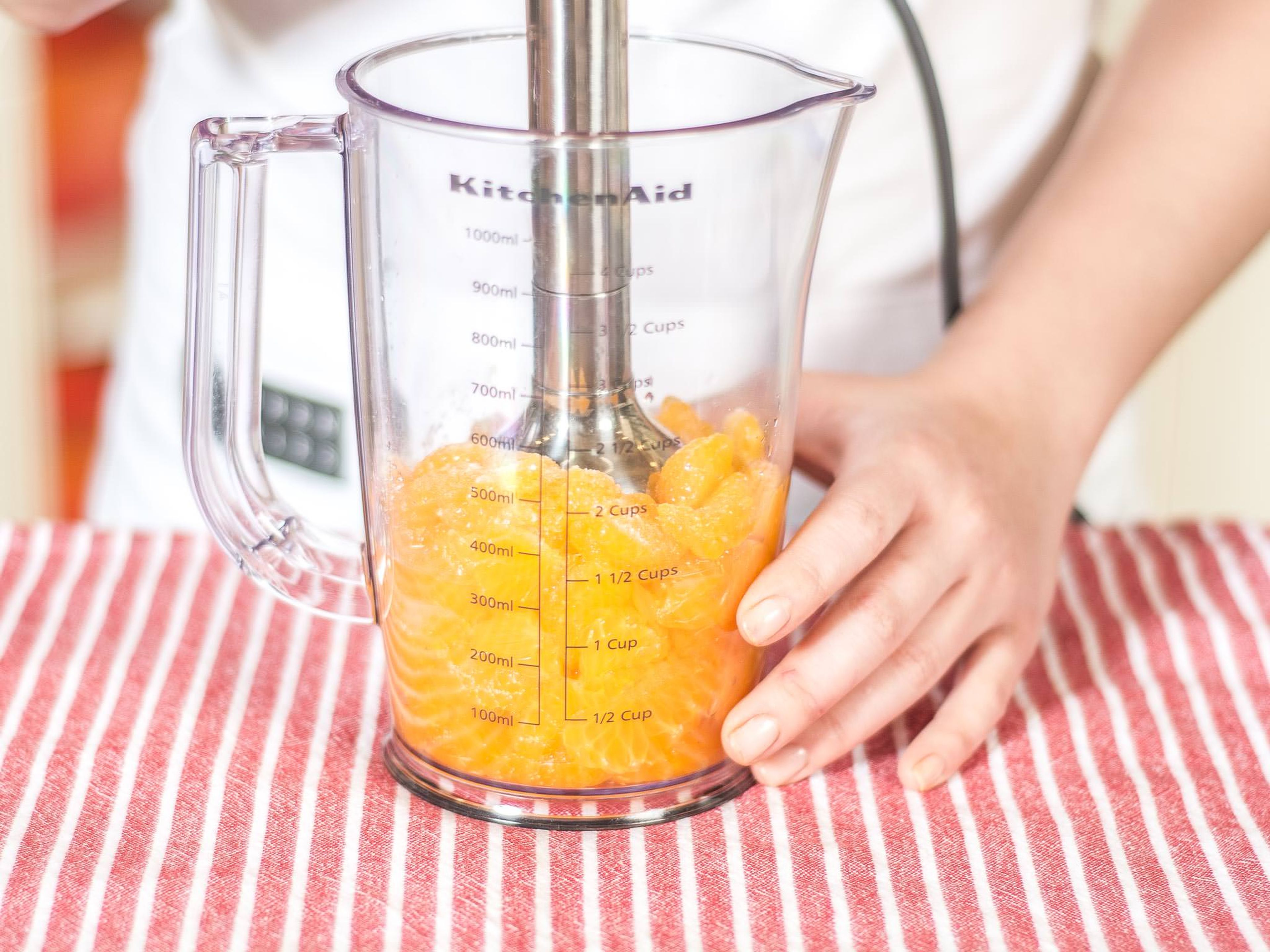 Drain the mandarins and puree in a measuring cup with the vanilla sugar.