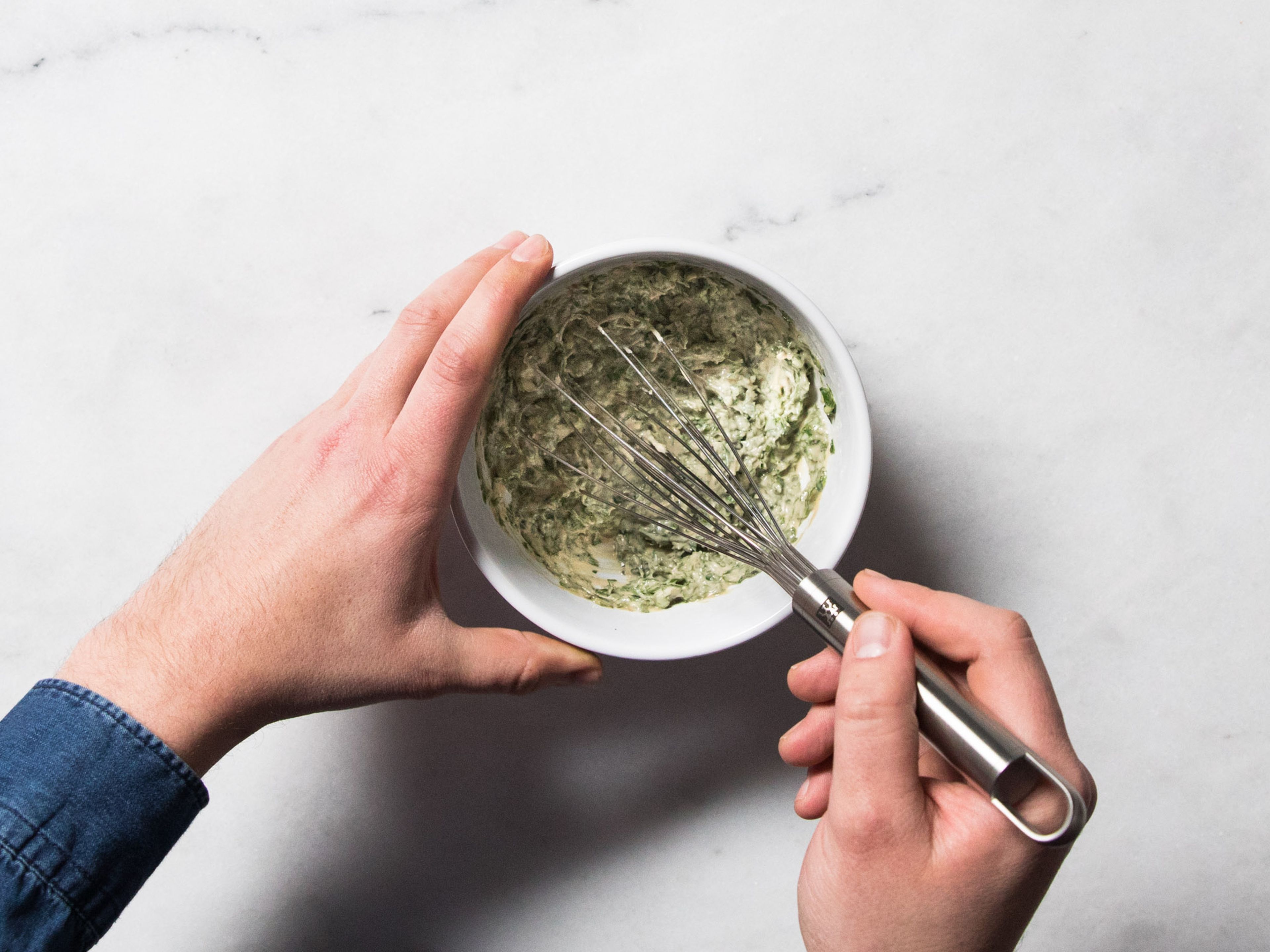 In the meantime, finely chop parsley and mint. Add chopped herbs, tahini, unfiltered apple juice, and lemon juice to a bowl and stir to combine. Season with salt and pepper to taste. If the mixture is too thick, add a little water to help reach a creamy consistency.