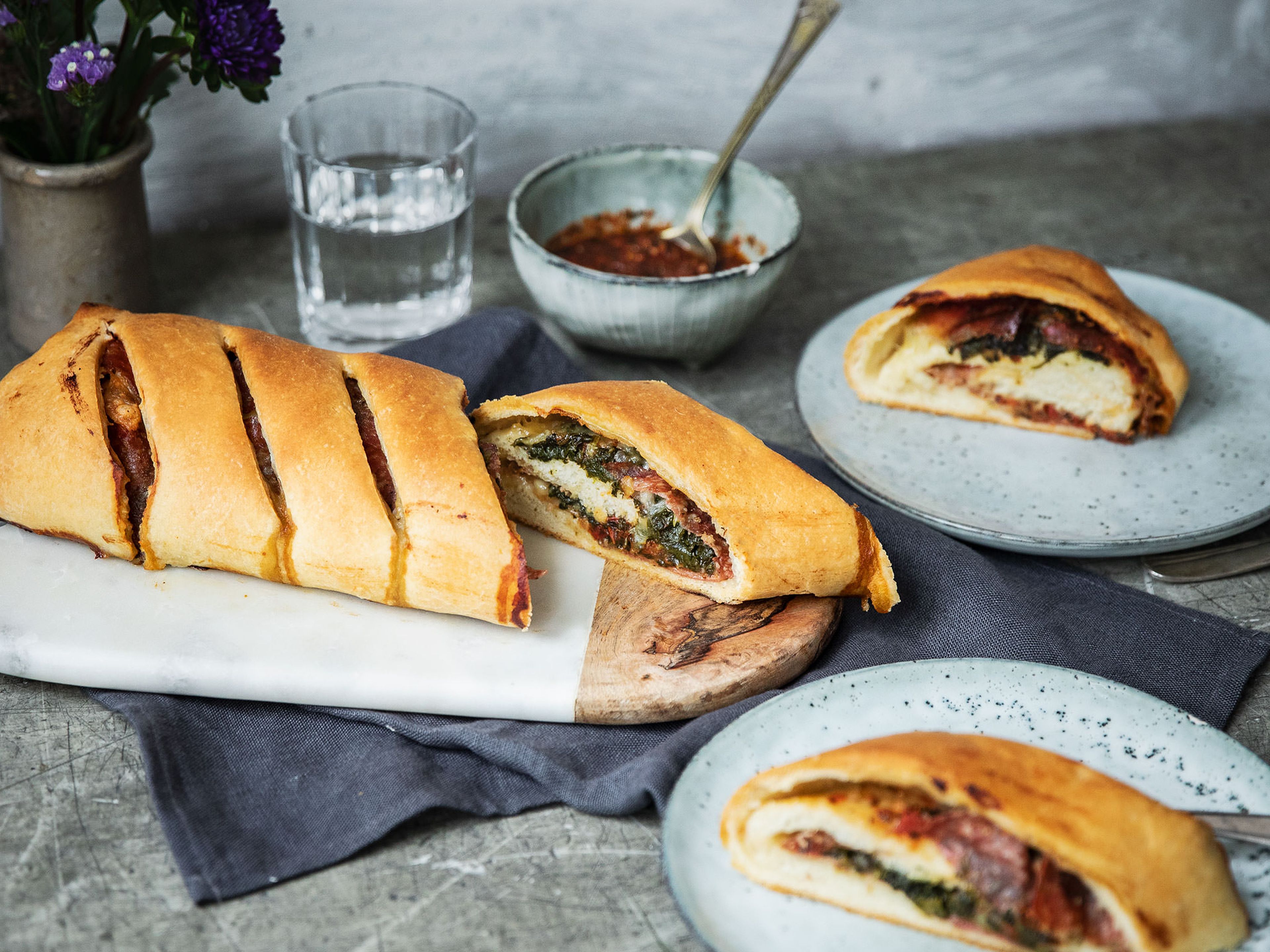 Spinach, salami, and mozzarella stromboli