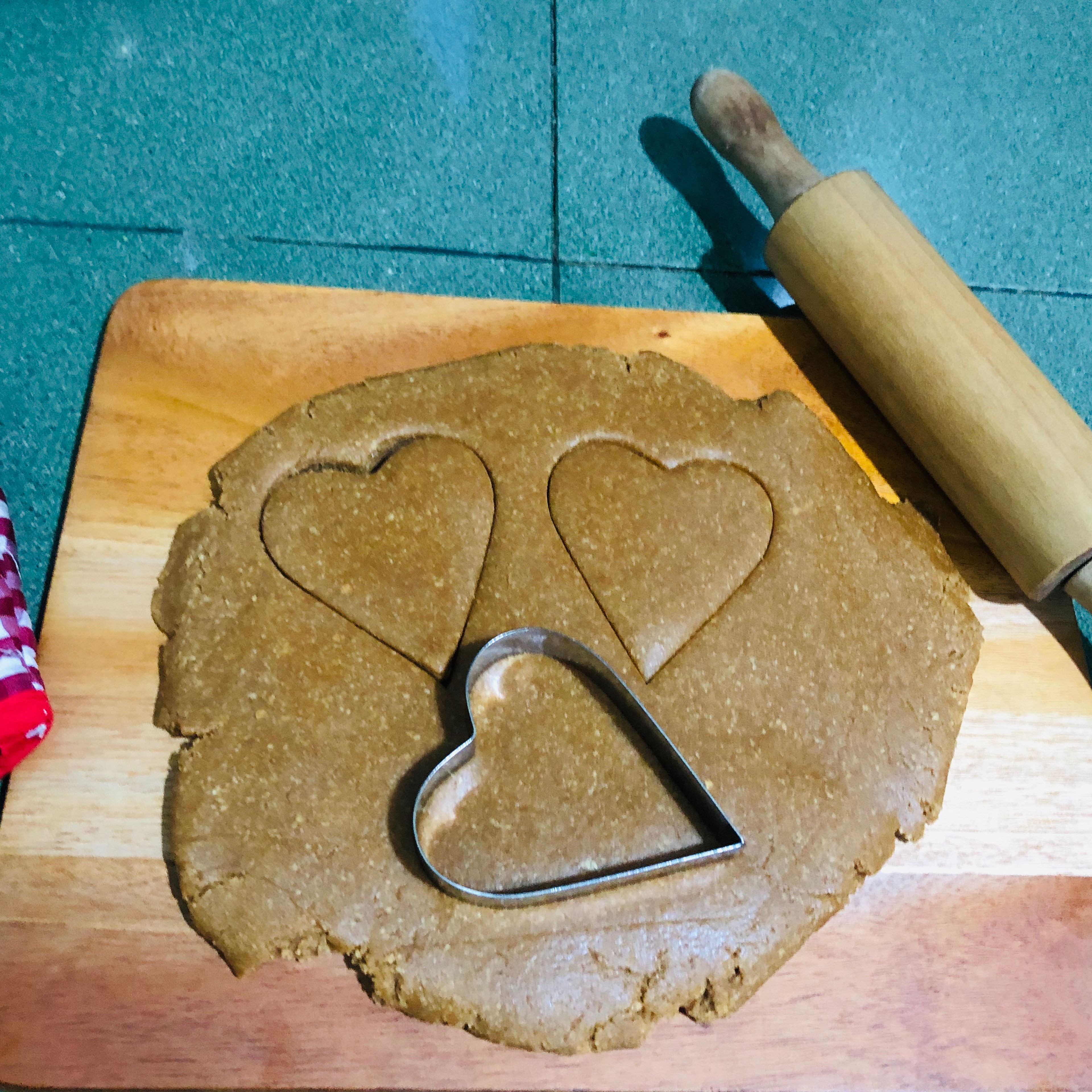 Roll the dough and cut it with cookie cutter.