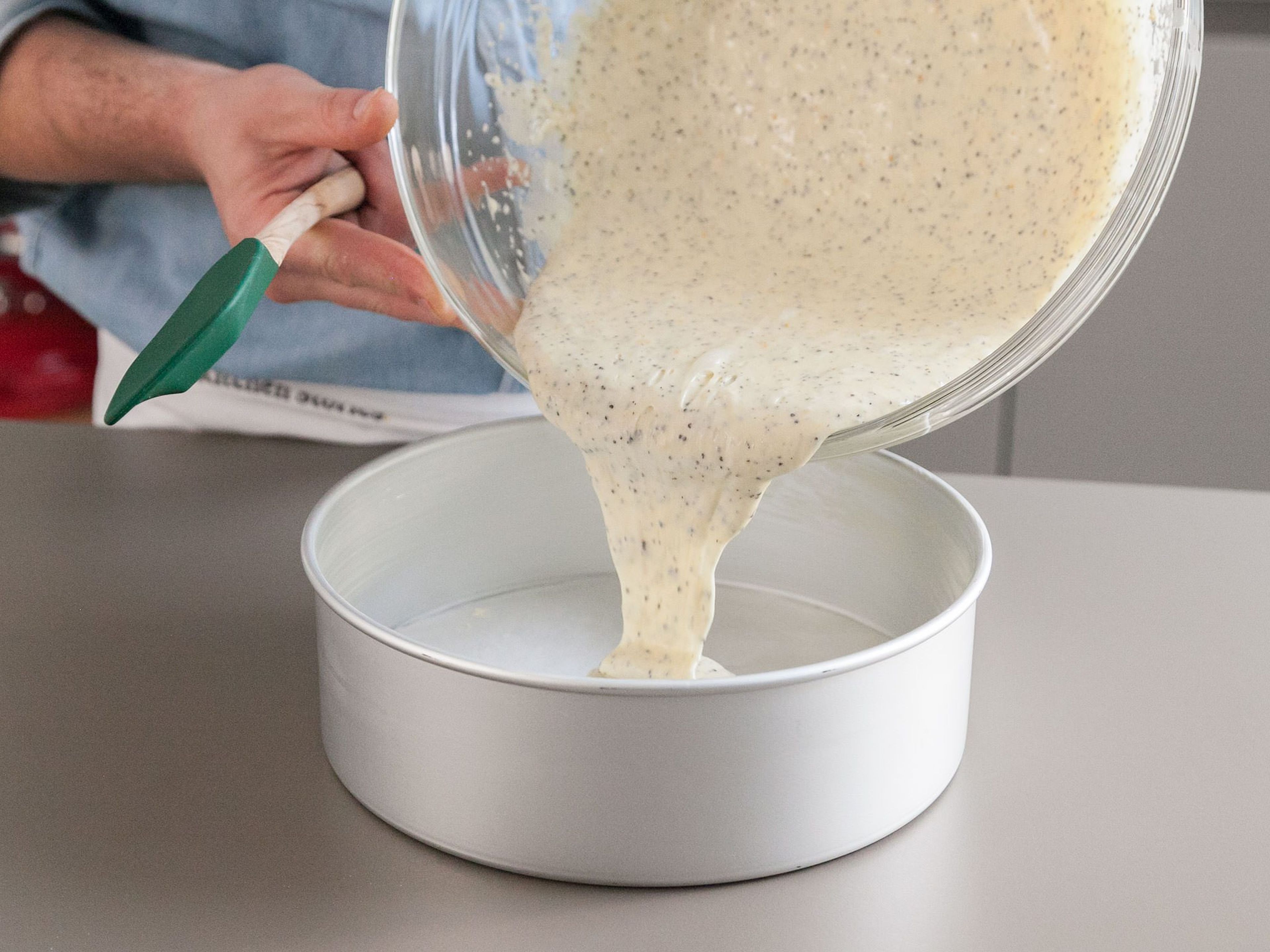 Add cake batter to baking pan. Place in oven for approx. 40 min., or until a toothpick inserted into the center of the cake comes out with a few moist crumbs. Remove from oven and place on a wire rack to cool.
